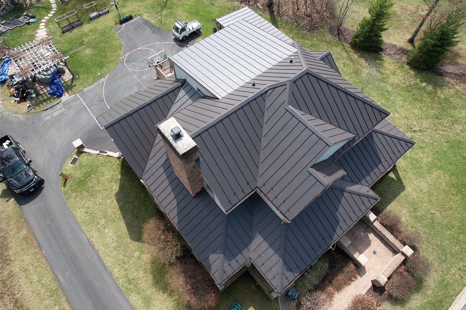 Metal Roof Replacement  by American Home Contractors
