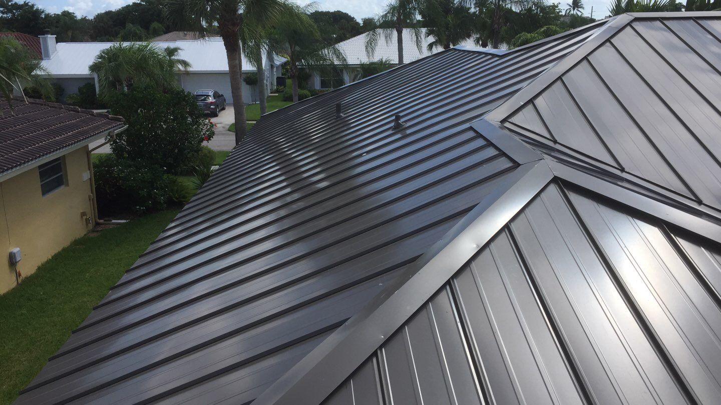 Residential Roofing Installation using 1" Nail strip metal roof by BLUES BROTHERS ROOFING