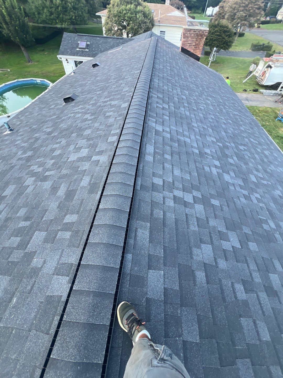 Onyx Black Shingles by Reimagine Roofing