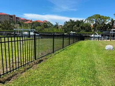 Black Aluminum Waterfront Fence Installation in Osprey