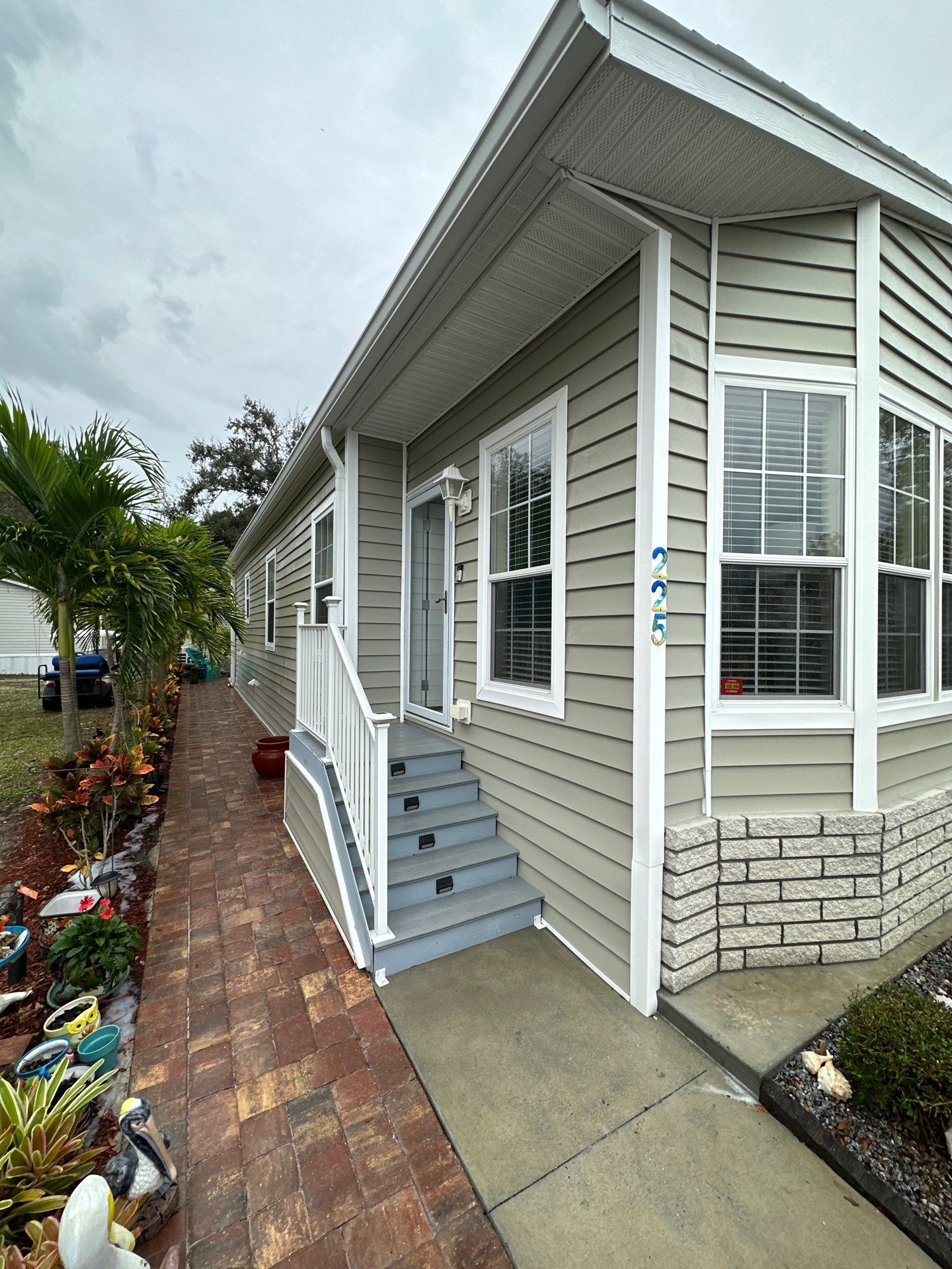 Gutter Cleaning and House Washing Services  by Sunshine AquaWash
