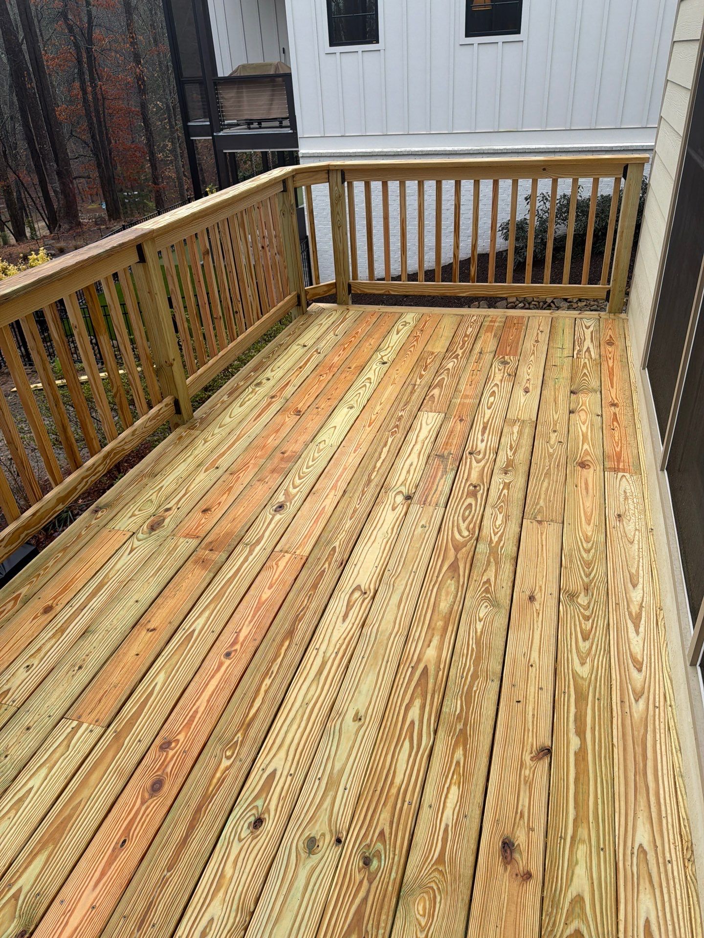 Buford, GA Deck Resurface and Extension using Pressure Treated Pine by Nelson Exteriors