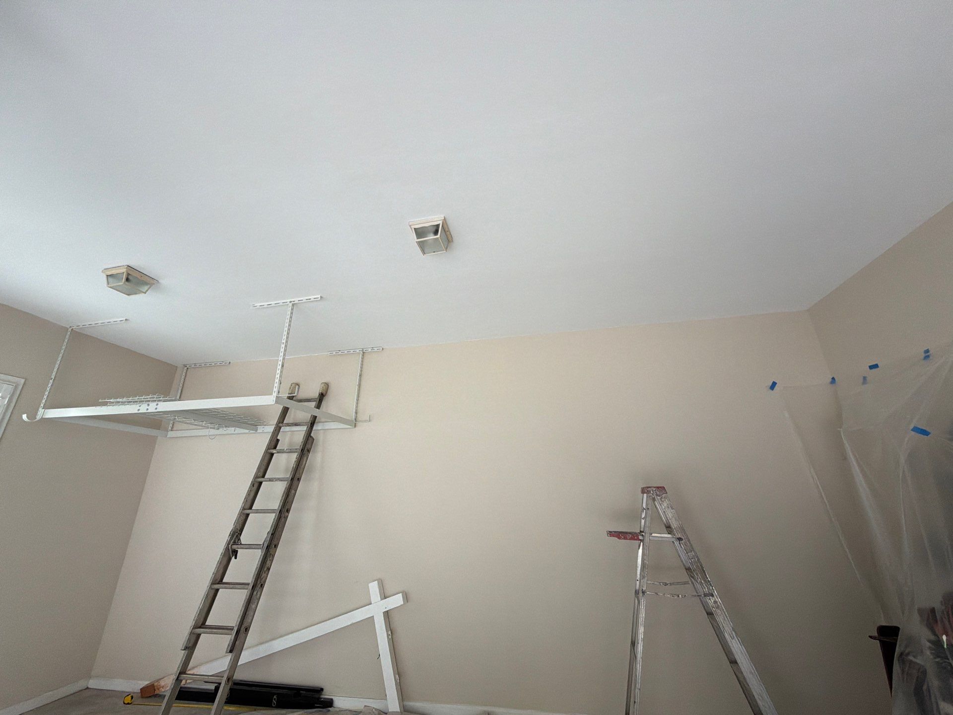 Multi-Story Stucco Home Exterior Painting and Garage Refresh in Marietta by Swift Home Renovations 