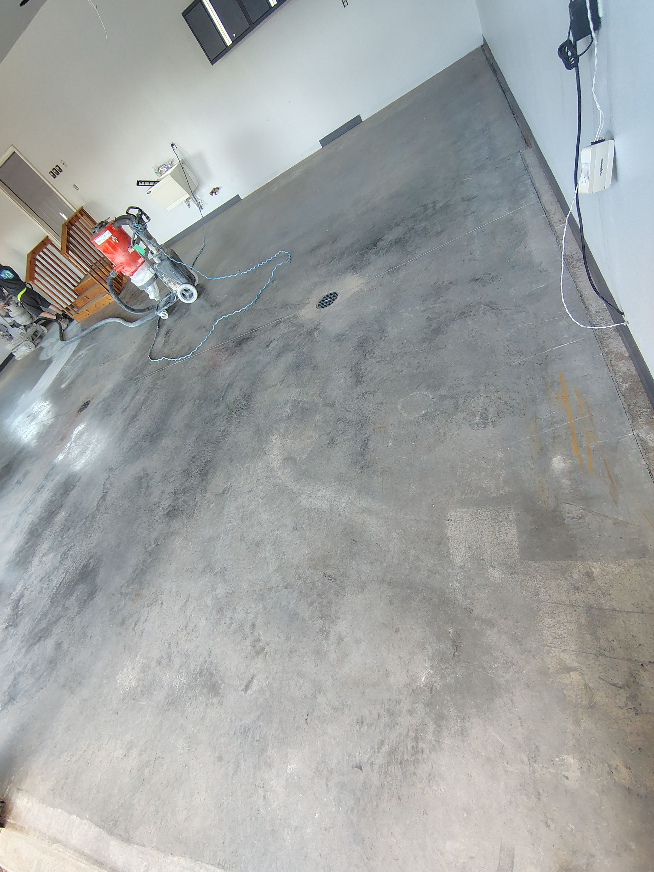 Multi-Car Garage Concrete Coating and Crack Repair in Dell Rapids by Select Painting, Coatings & Garage Cabinets
