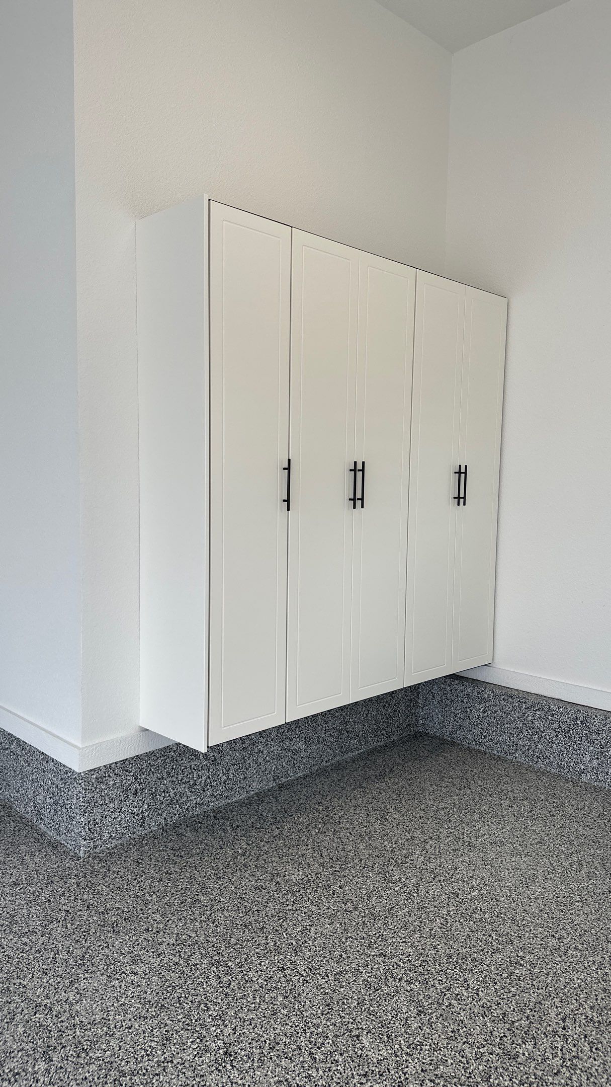 Mike & Pam transformed their garage with a Banner Garage Floor and Cabinets by Banner Garage