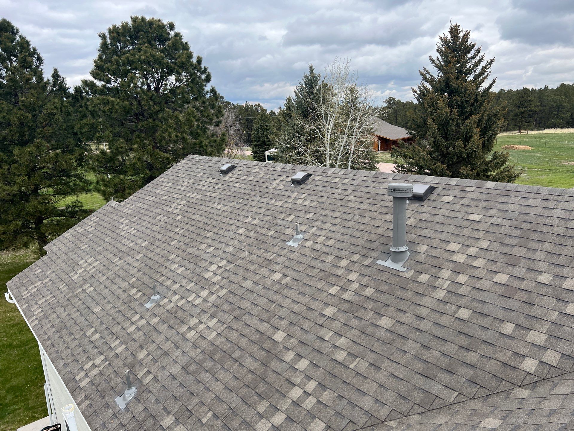 Residential Roofing Installation using Atlas Pinnacle Impact Weathered Wood by Blue Peaks Roofing LLC 