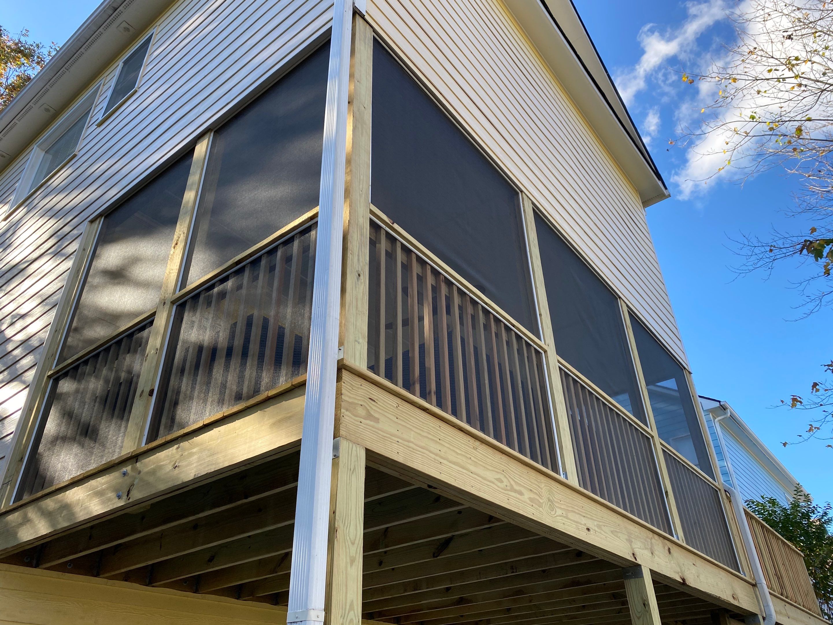 Elevated Pressure-Treated Deck and Screened Porch Build in Atlanta by Swift Home Renovations