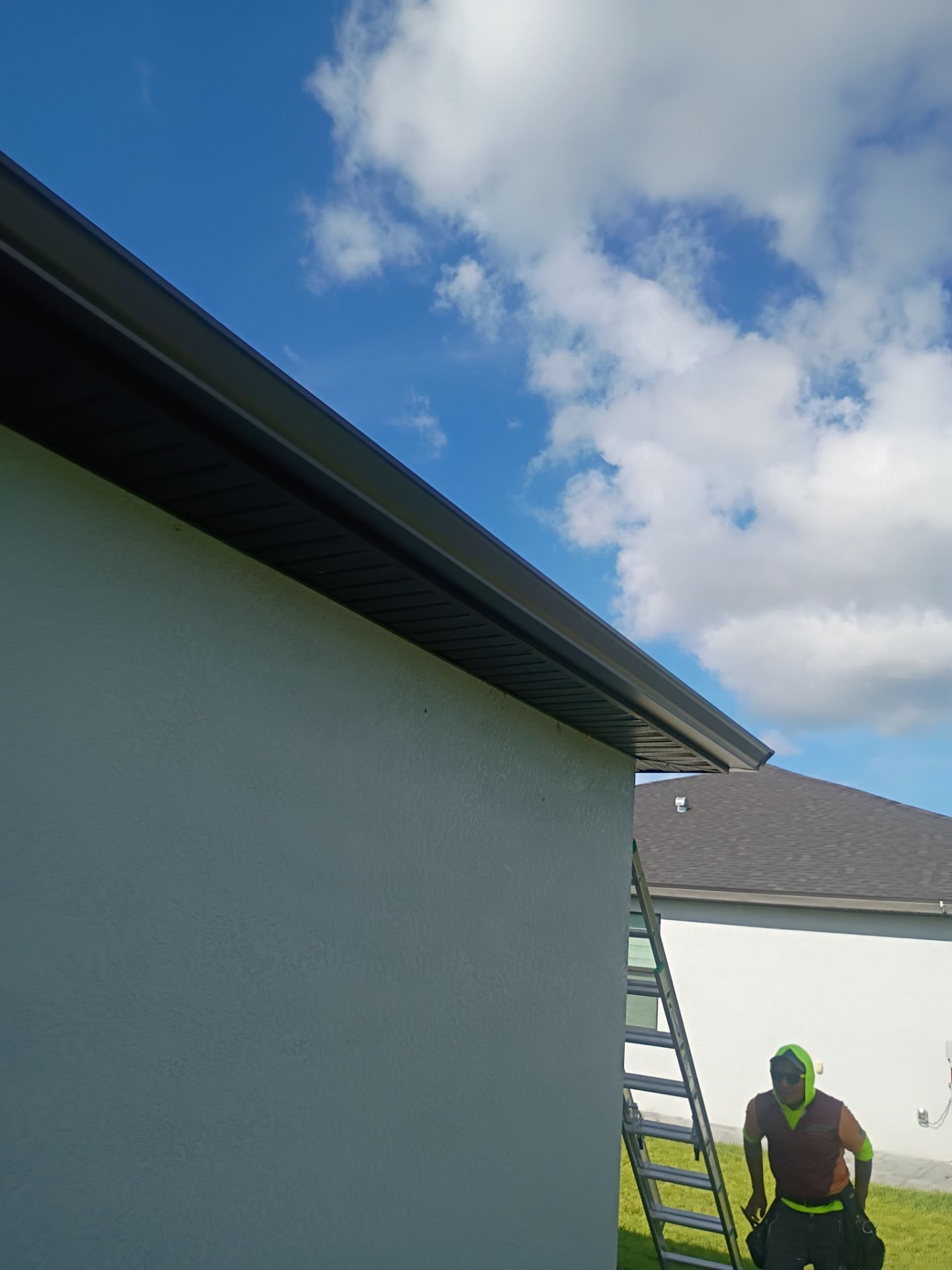 Dark Bronze Seamless Gutters using 6 Inch Seamless Gutters in Cape Coral FL by Gutter Professors