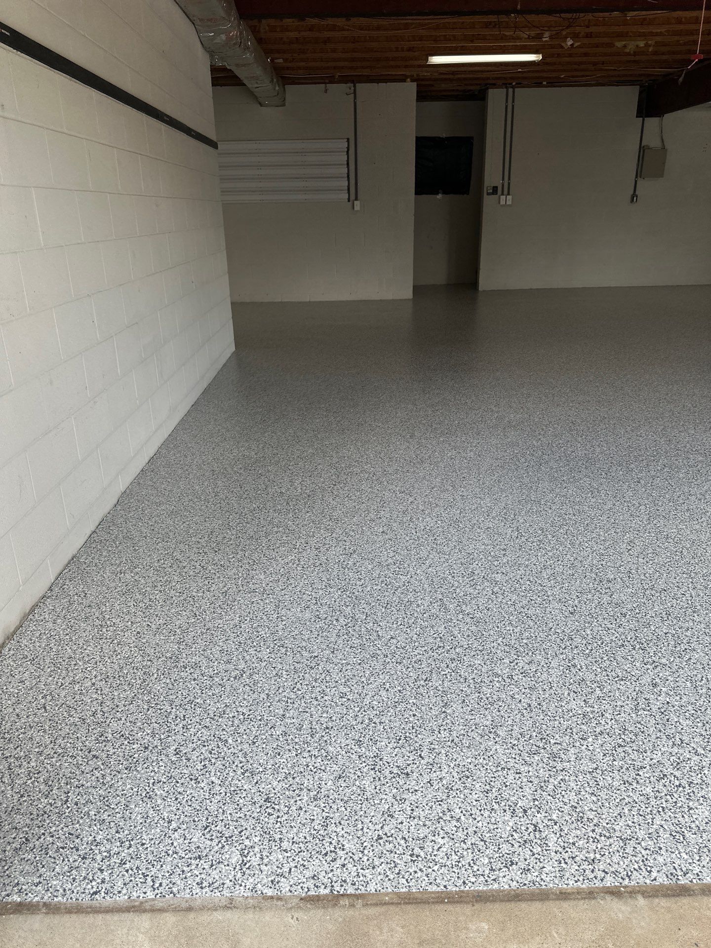 Garage Floor Coating using Gravel by My Garage Floor Guys