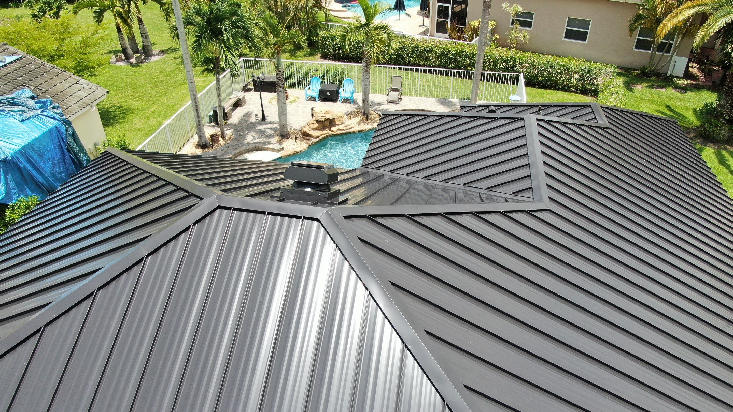 24ga 1.5" Mechanical Seam Matte Black by Total Roofing System The Metal Roof Experts