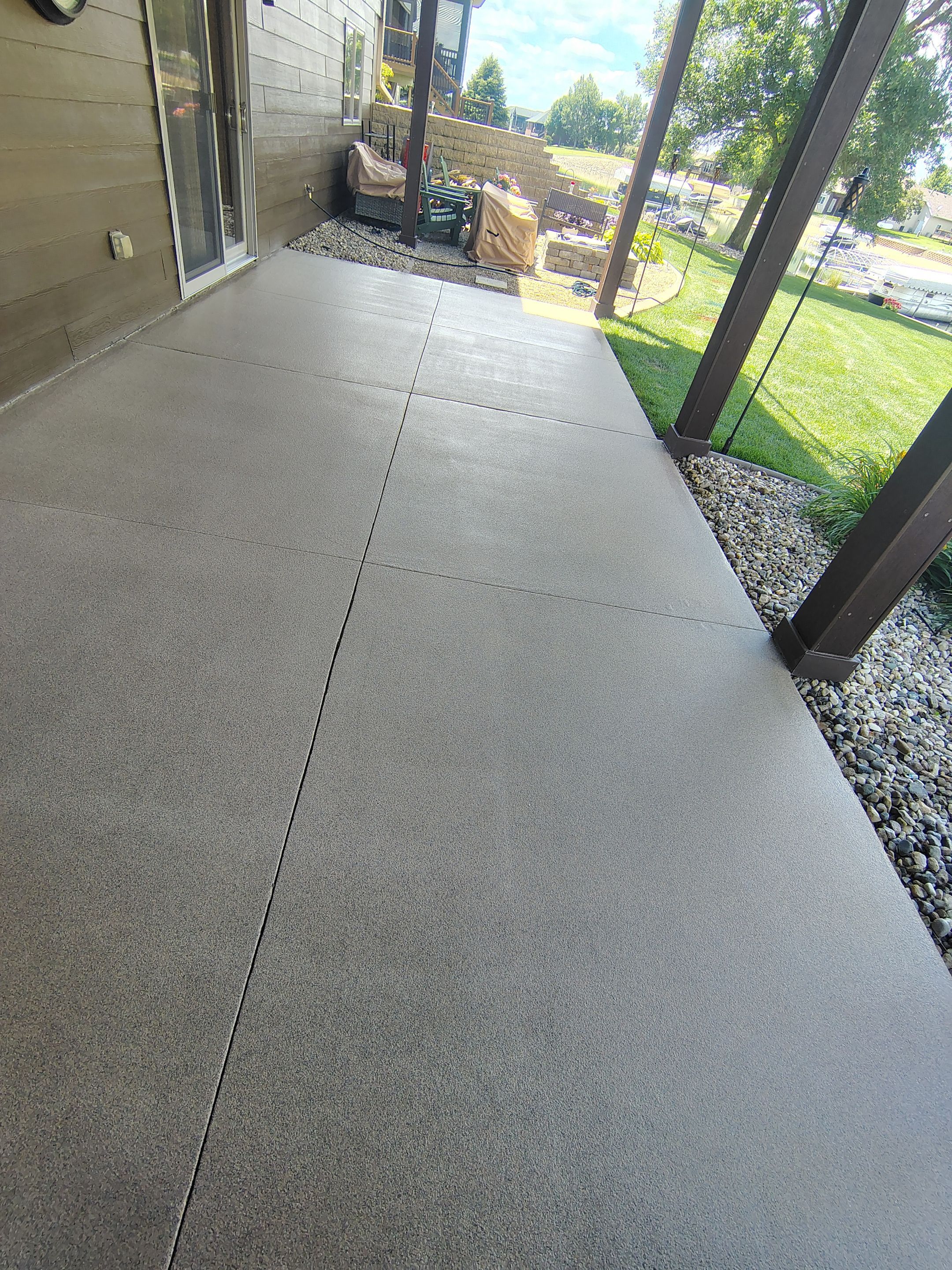 Textured Concrete Coating and Entryway Restoration in Madison by Select Painting, Coatings & Garage Cabinets