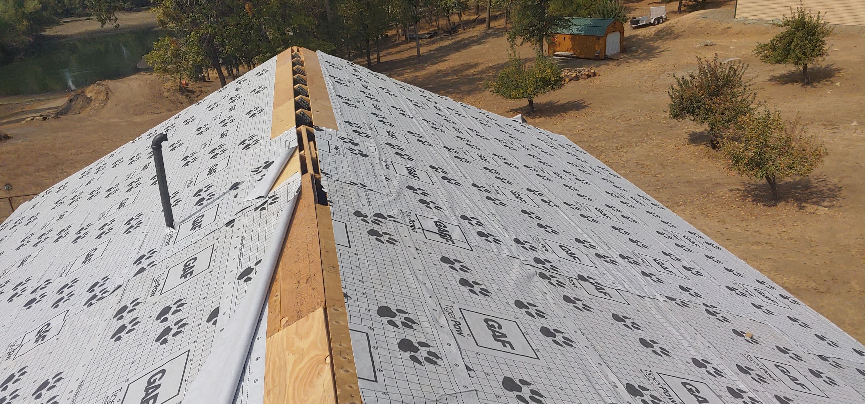 Residential Roofing Installation using Standing seam metal roofing system by Straight Edge Roofing Inc