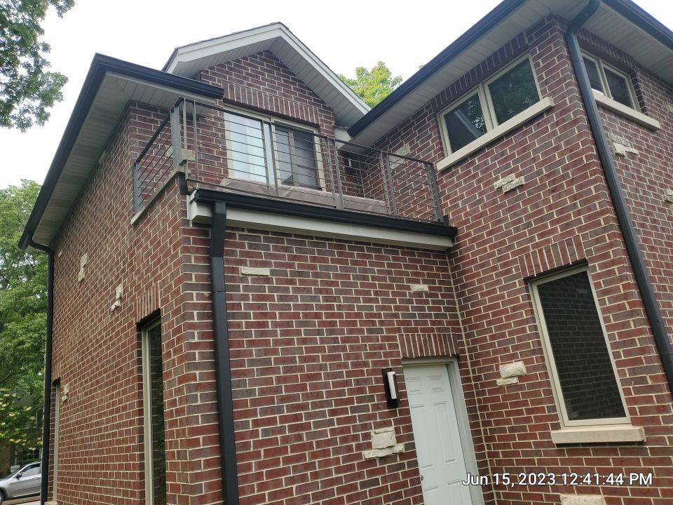 Highland Park, IL Bluestone, concrete,  Trex deck cleaning by Northern Power Washing LLC.