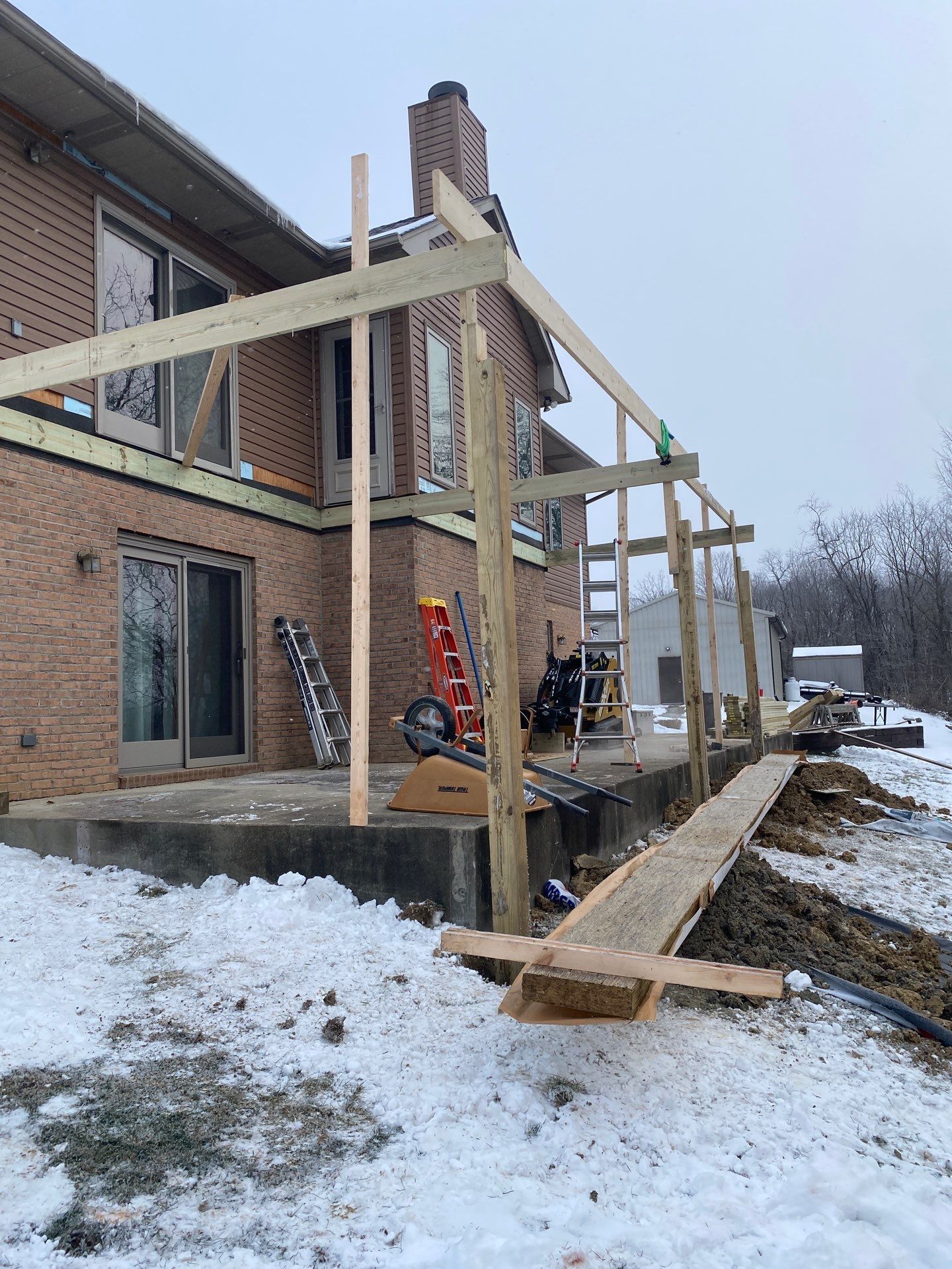 Deck and Roof Build by Cousins Roofing Siding & Decks
