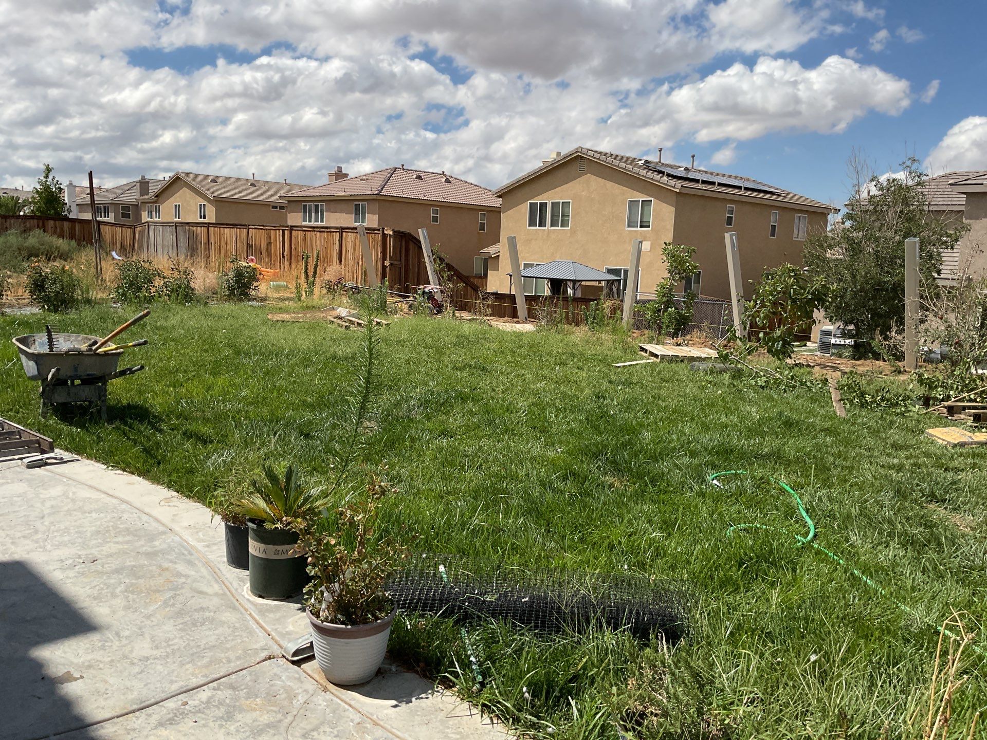 Tan Vinyl by Fence Guys Inc. 