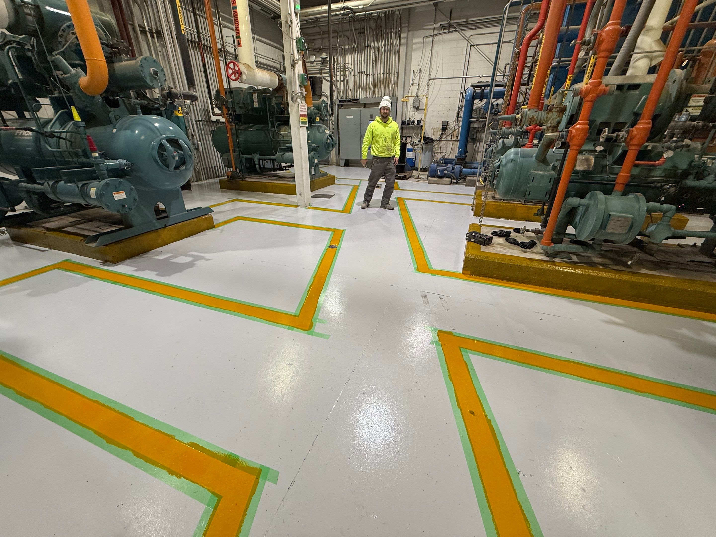 Industrial Epoxy Floor Coating for Perdue Premium Meat Co in Sioux Center by Select Painting, Coatings & Garage Cabinets