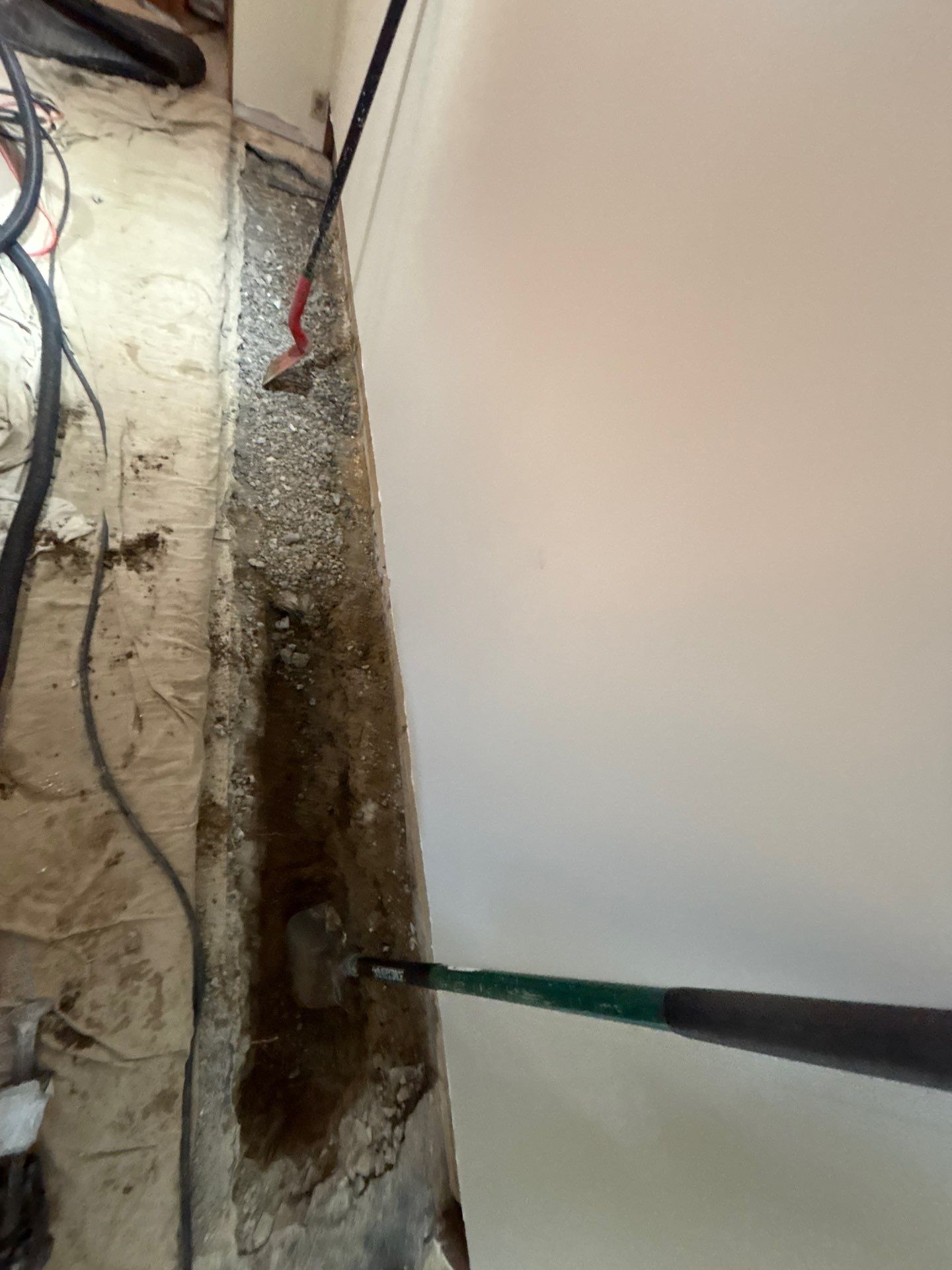 Completing the Connection for Lisa's Drain Tile System by Waterproofing Northeast