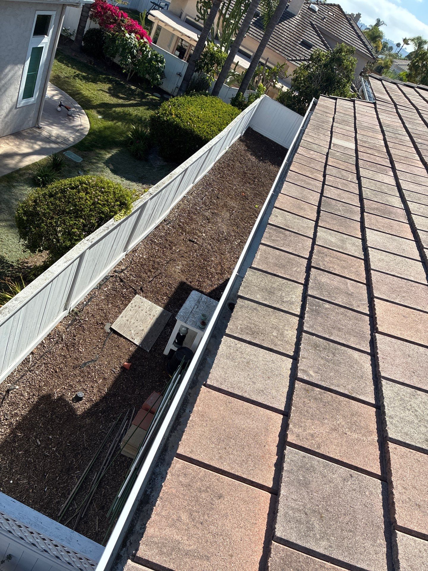 Carlsbad Concrete Tile Roof Replacement with Copper Flashing and Skylights by Reliable Roofing San Diego Inc.