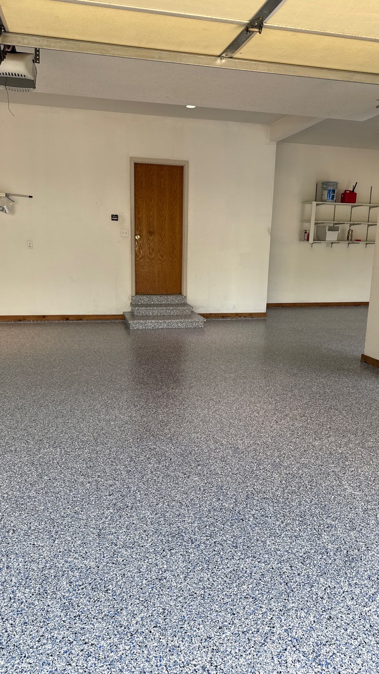 Custom "Comet" Epoxy Garage Floor Renovation in Lawrence by Banner Garage
