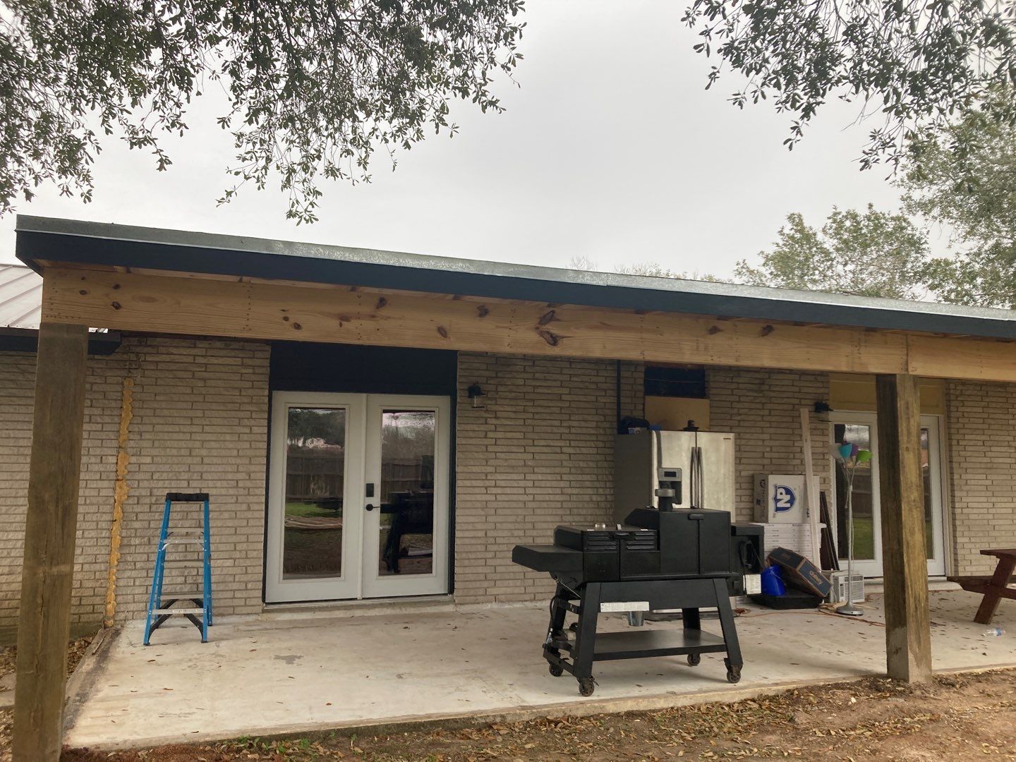 Beeville Backporch sittin' by Bayfront Roofing and Construction