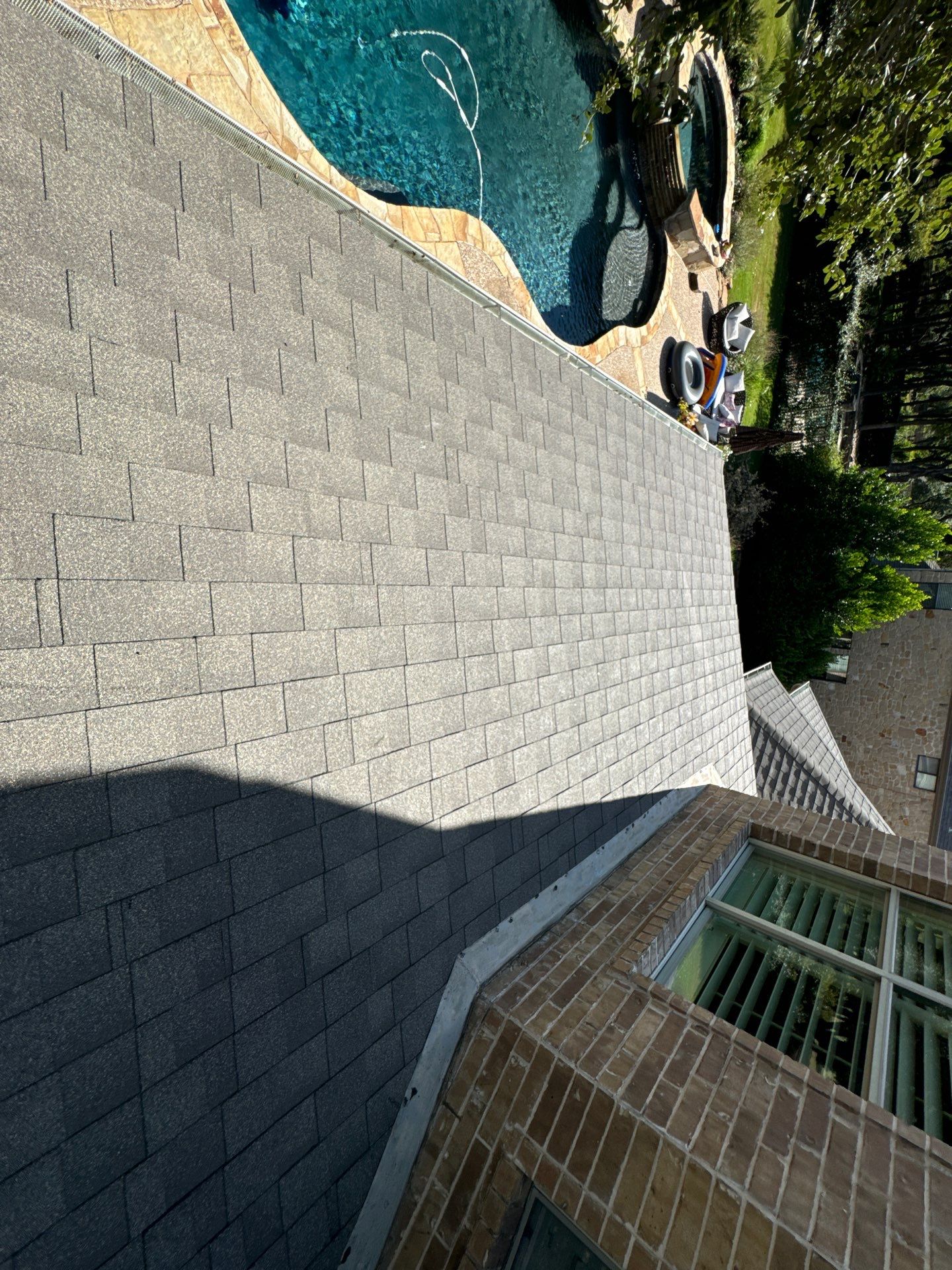 Residential Roofing Installation using IKO, Cambridge in Weathered Wood by Oakwood Roofing and Construction, LLC