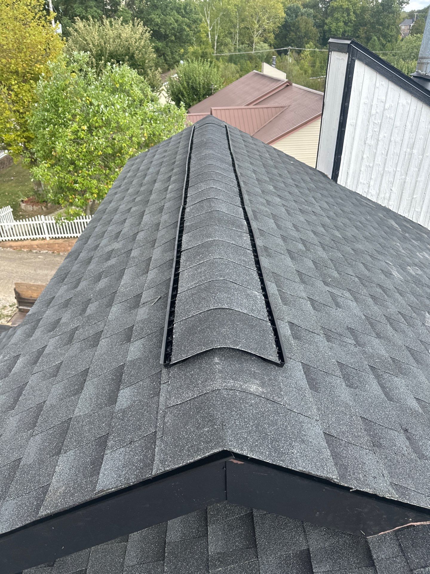 Residential Roofing Installation using GAF Timberline HDZ Charcoal by Rainstoppers Roofing