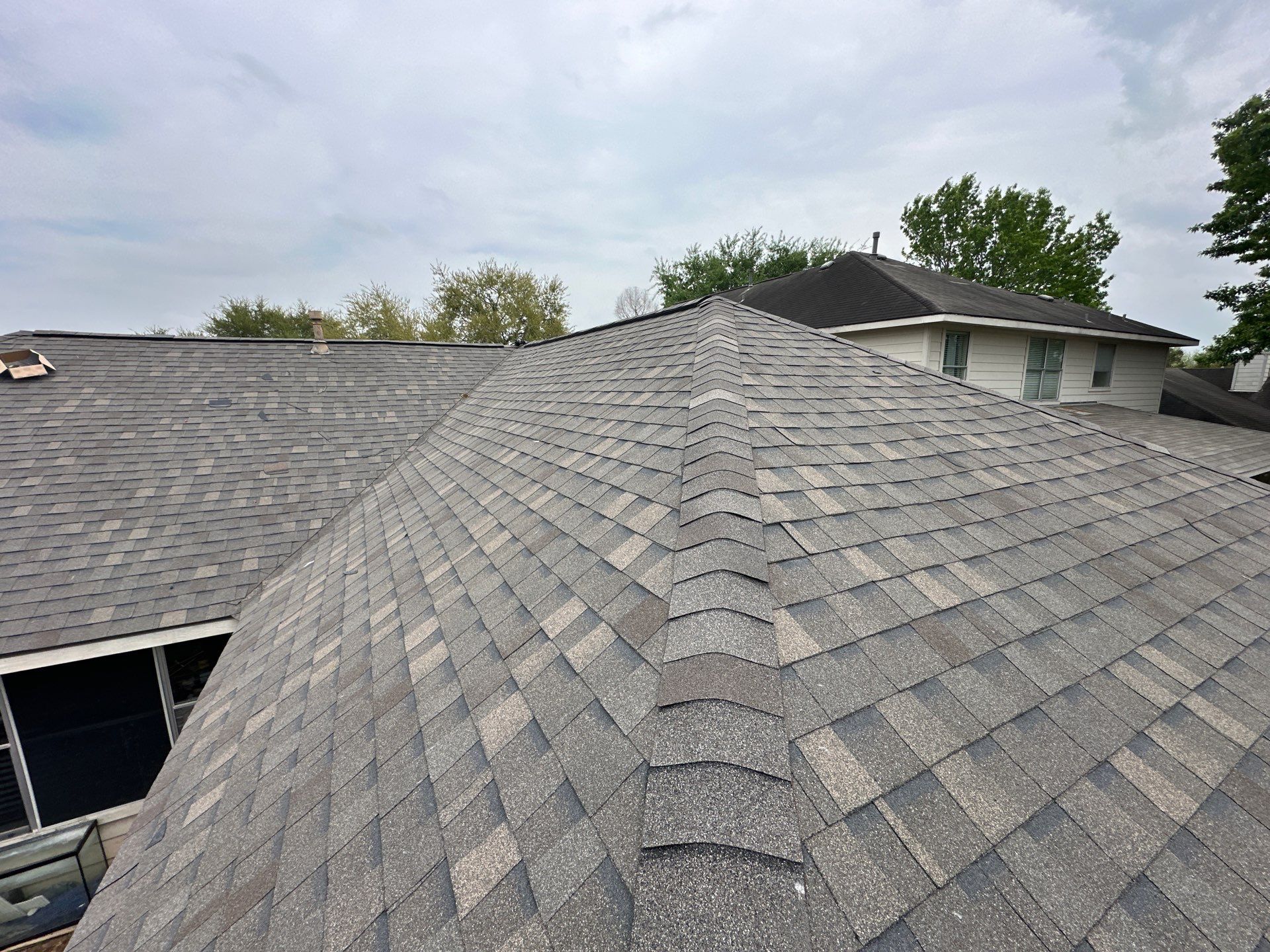 Residential Roofing Installation using Atlas Prolam by Motion Roofing