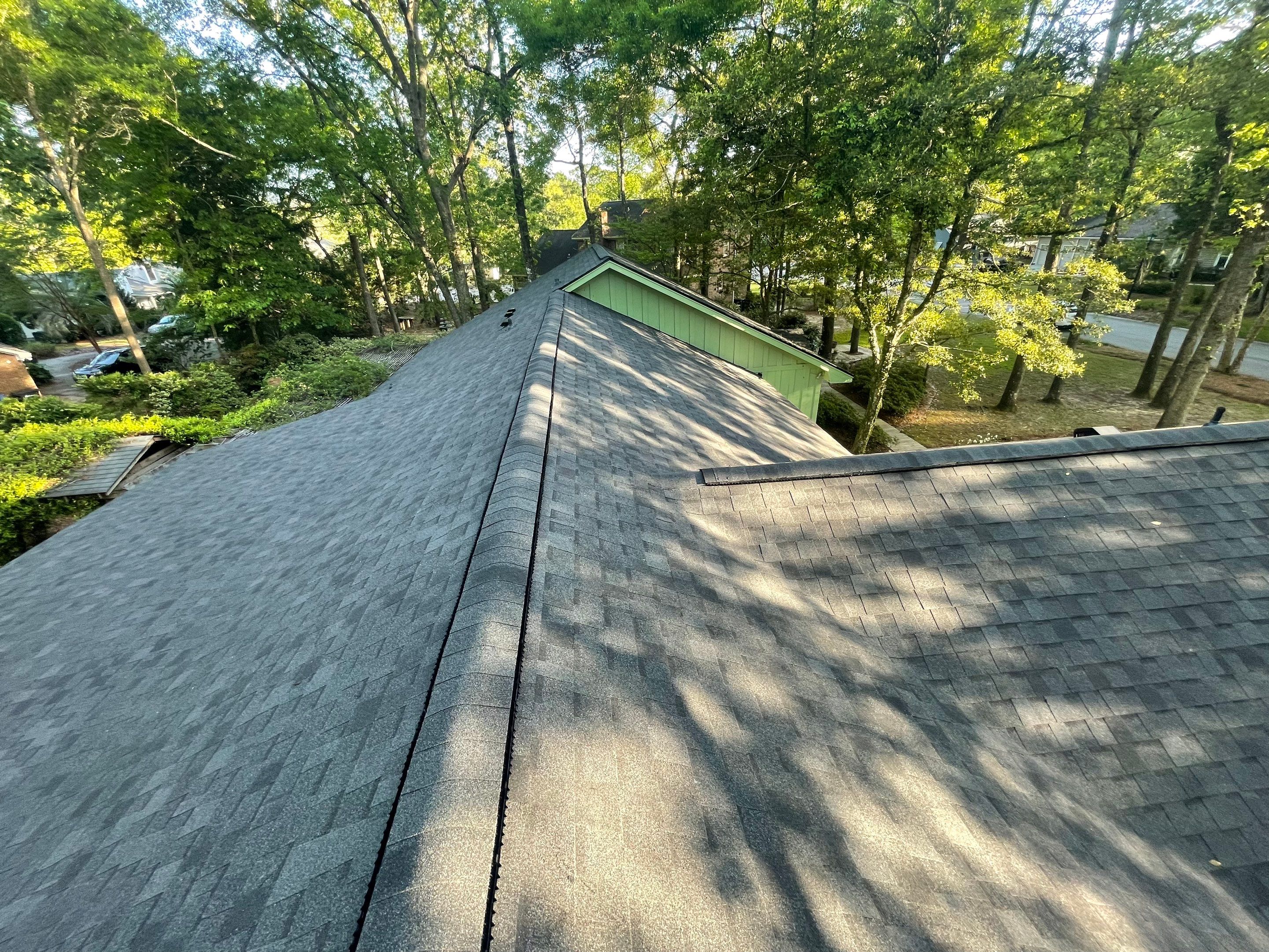Hail Damage using Atlas Pristine Pinnacle Shingles by Artigues Roofing & Restoration Services