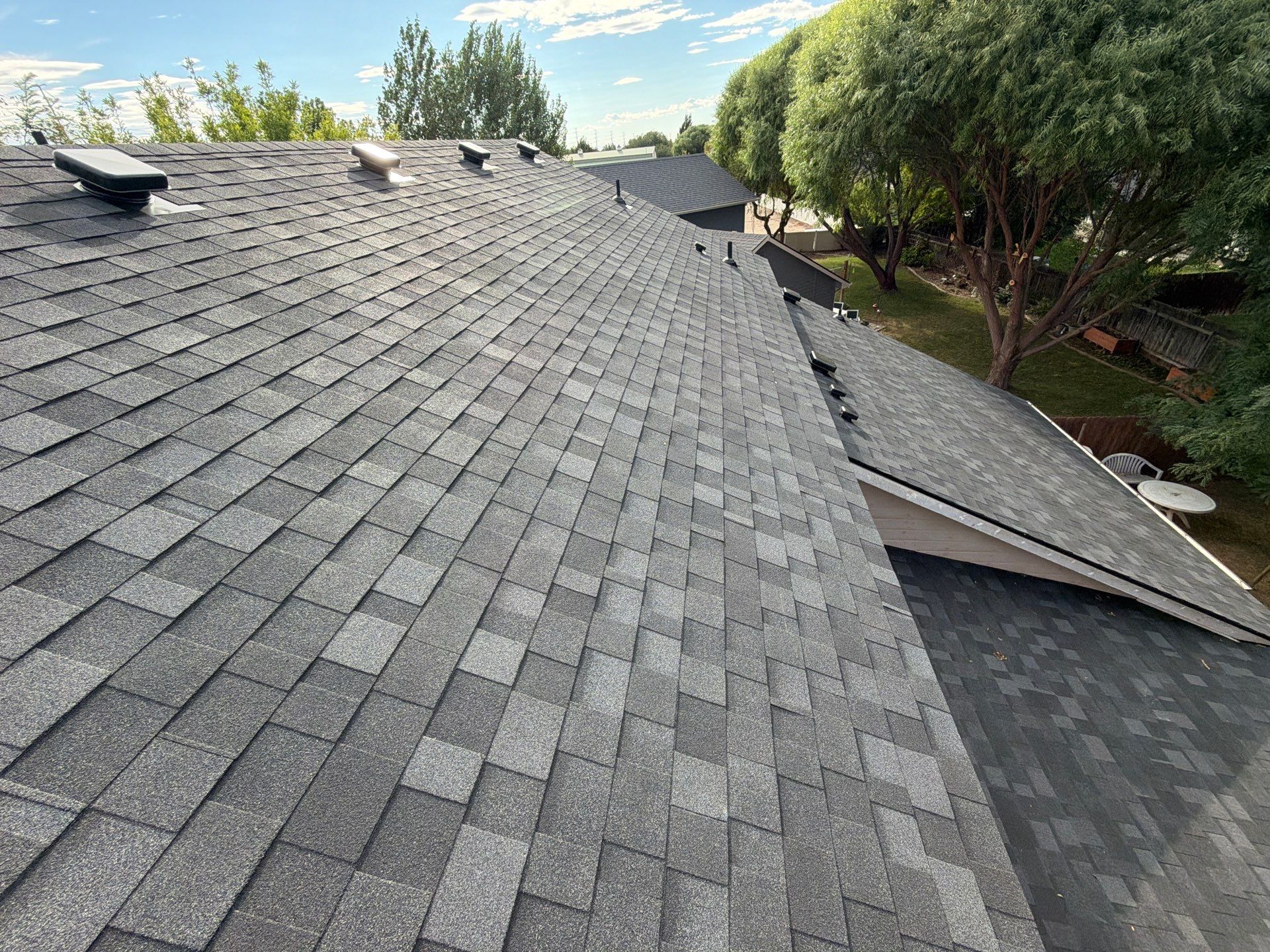 Residential Roof Replacement in Meridian Featuring Charcoal Architectural Shingles by Olive Roofing