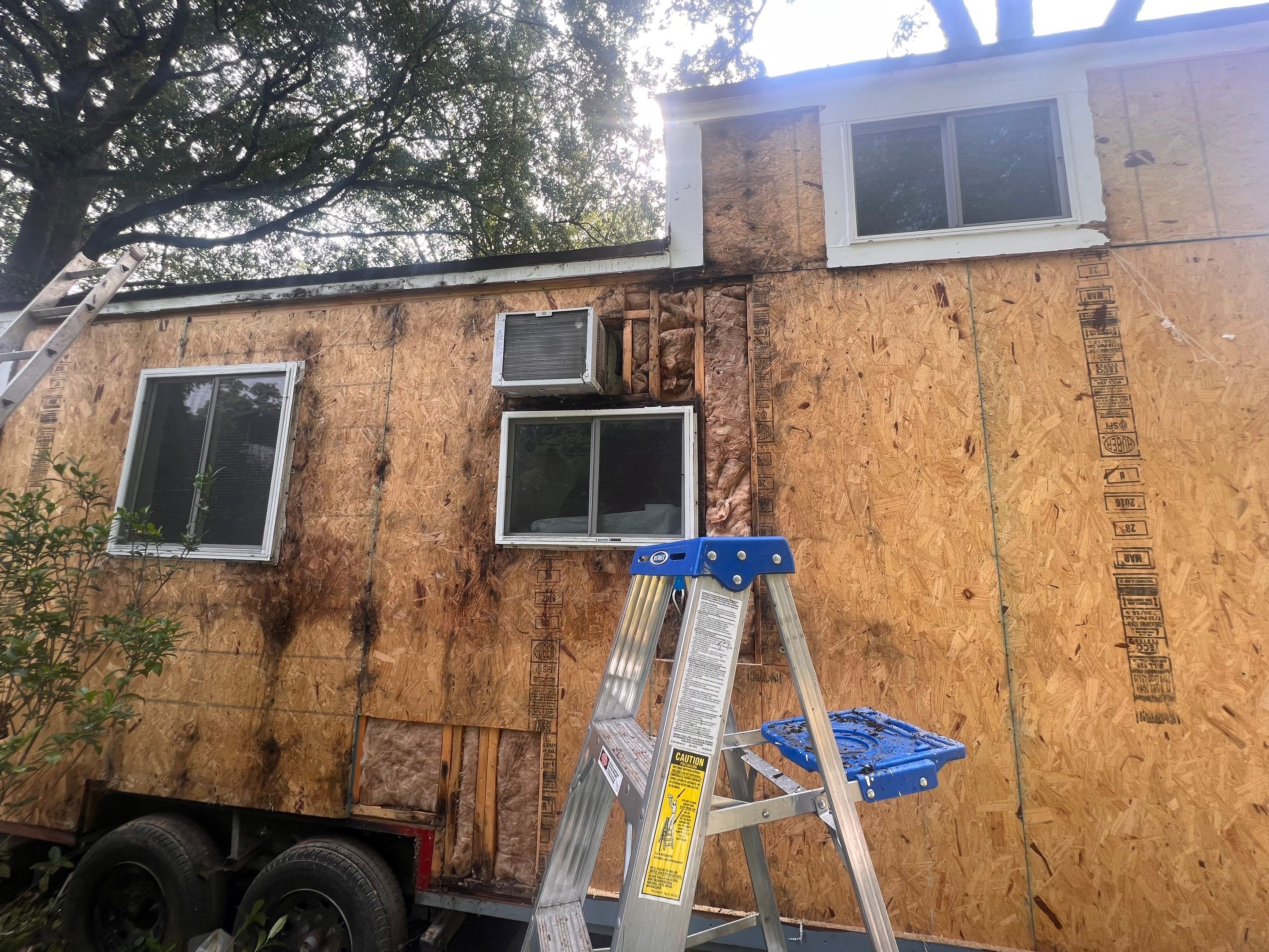 tiny home remodel- siding,paint,roofing by Nailed It Roofing & Remodeling LLC