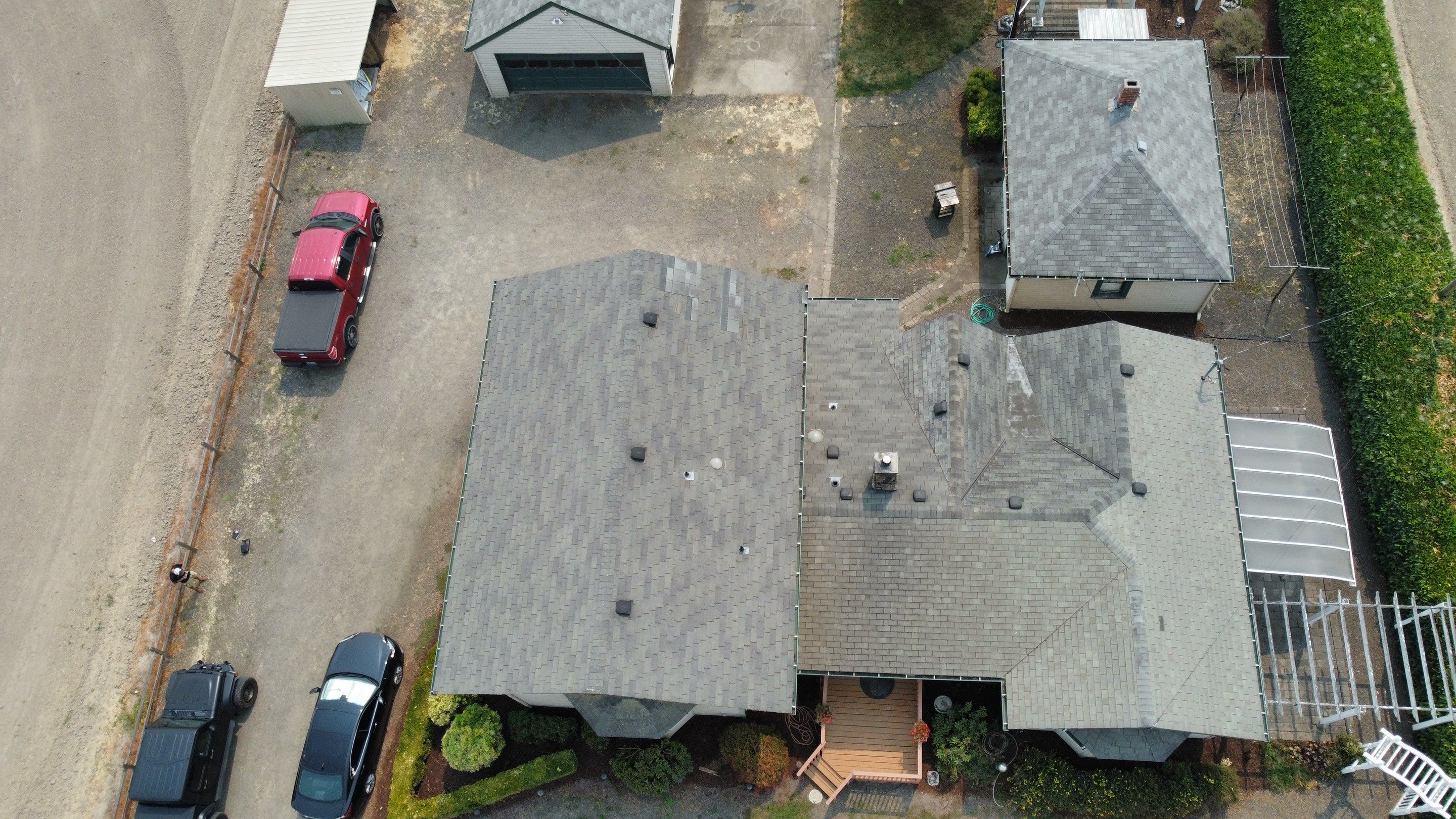 Residential Roofing Installation using IKO Dynasty (Color: Granite Black) by Orezona Building & Roofing Company, Inc.