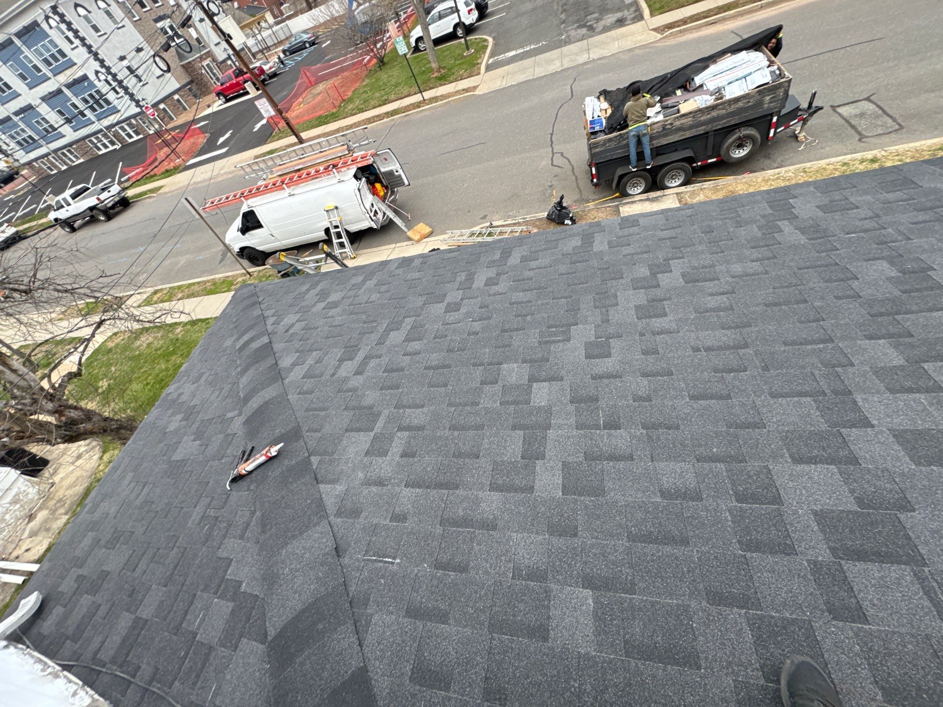 Onyx Black Shingles by Reimagine Roofing