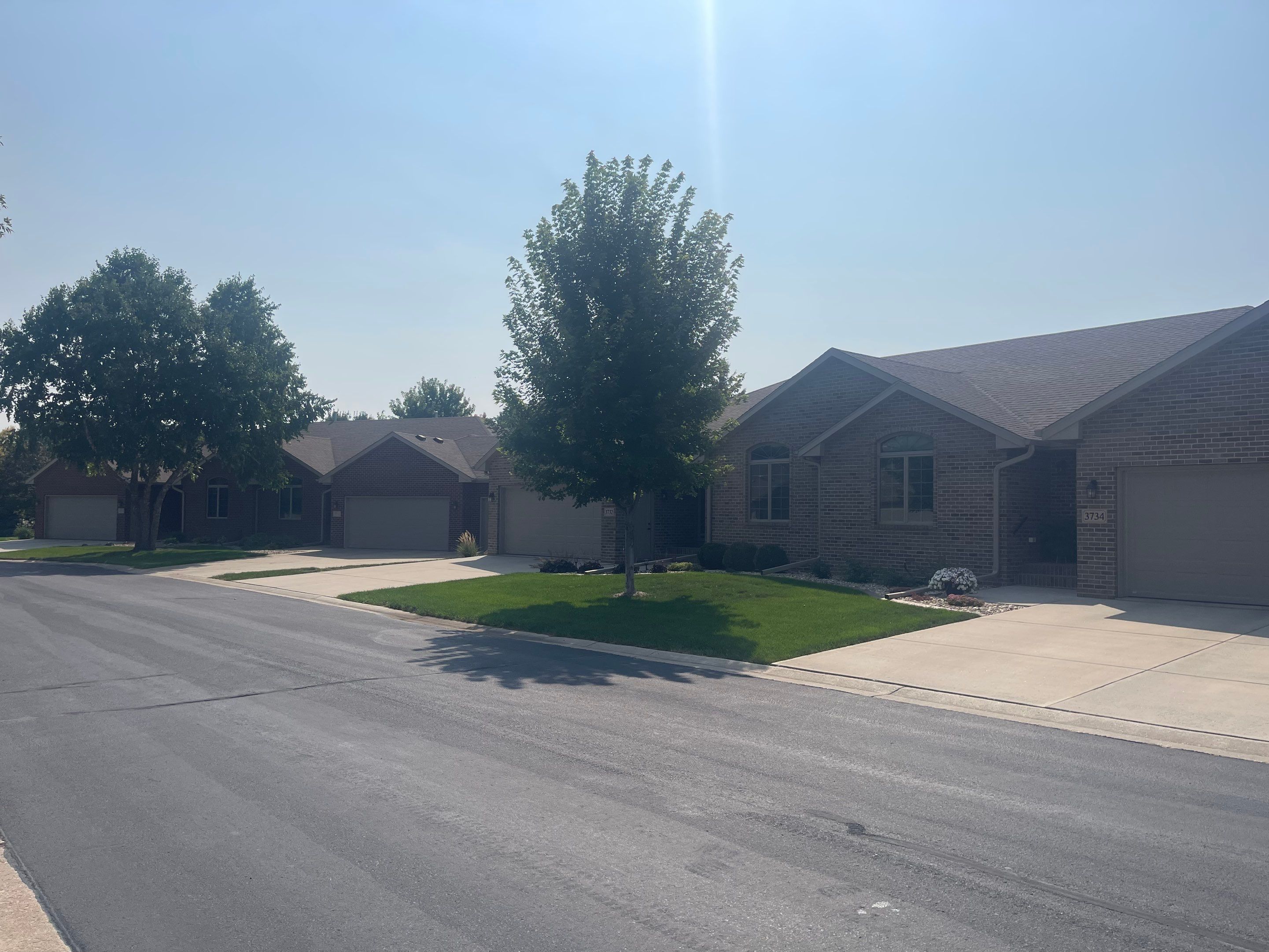 Residential Exterior Siding and Trim Painting in Sioux Falls by Select Painting, Coatings & Garage Cabinets