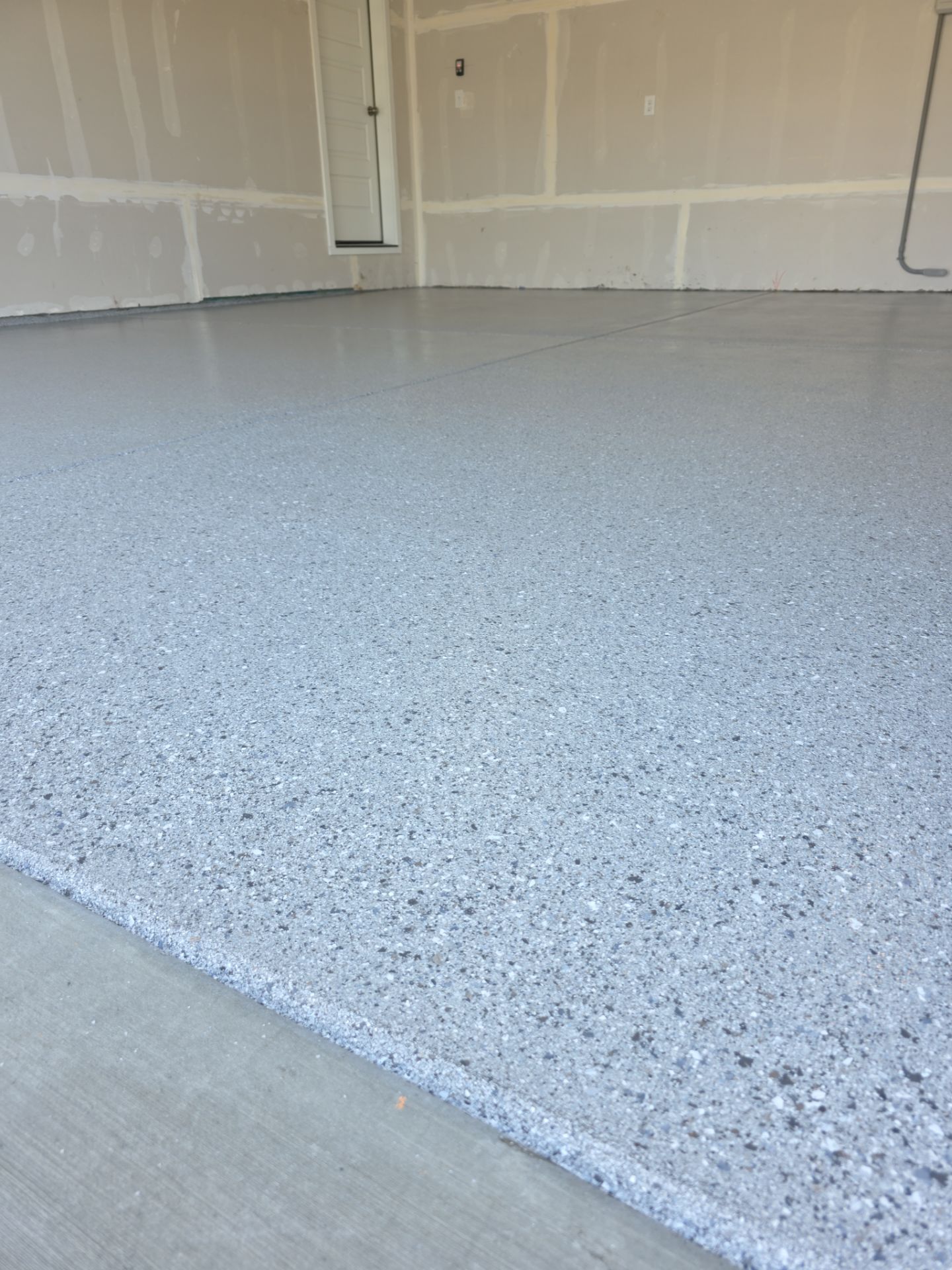 Garage Transformation using Battleship Hybrid by Croc Coatings, LLC