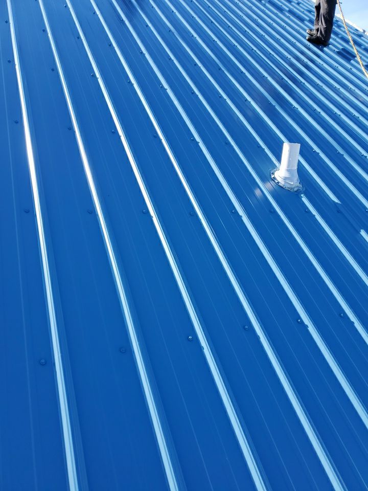 Commercial Roofing Installation using Metal roofing by American Roofing & Construction LLC