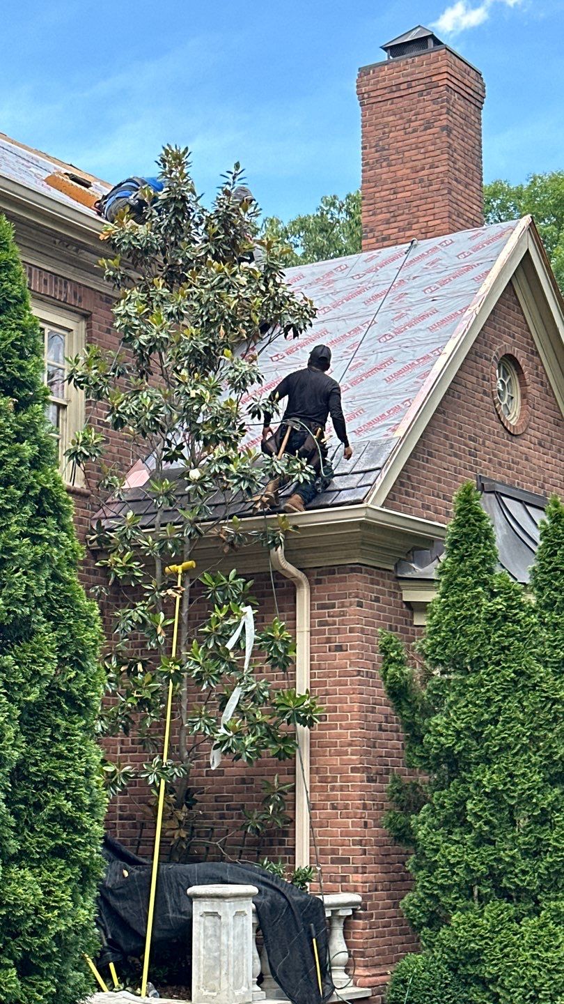 Residential Roofing Installation Using Enviroshake Synthetic Slate by Undersun Roofing 