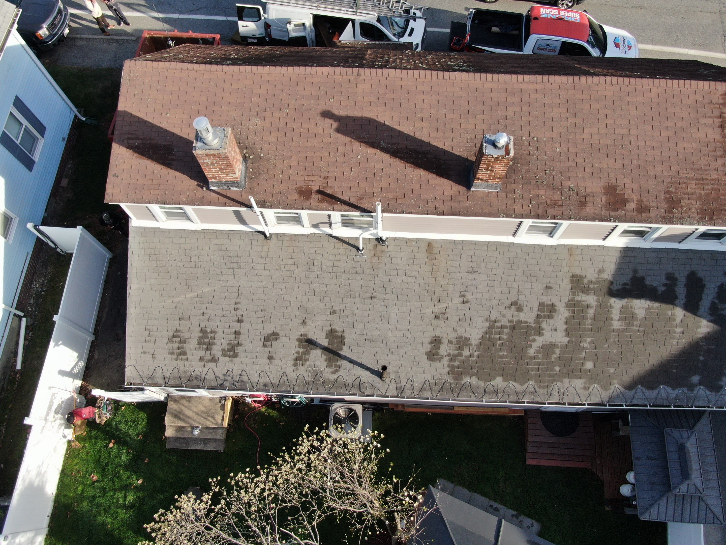Roof Replacement with Owens Corning TruDefinition Shingles in Midnight Plum by Mighty Dog Roofing of Greater Middlesex County
