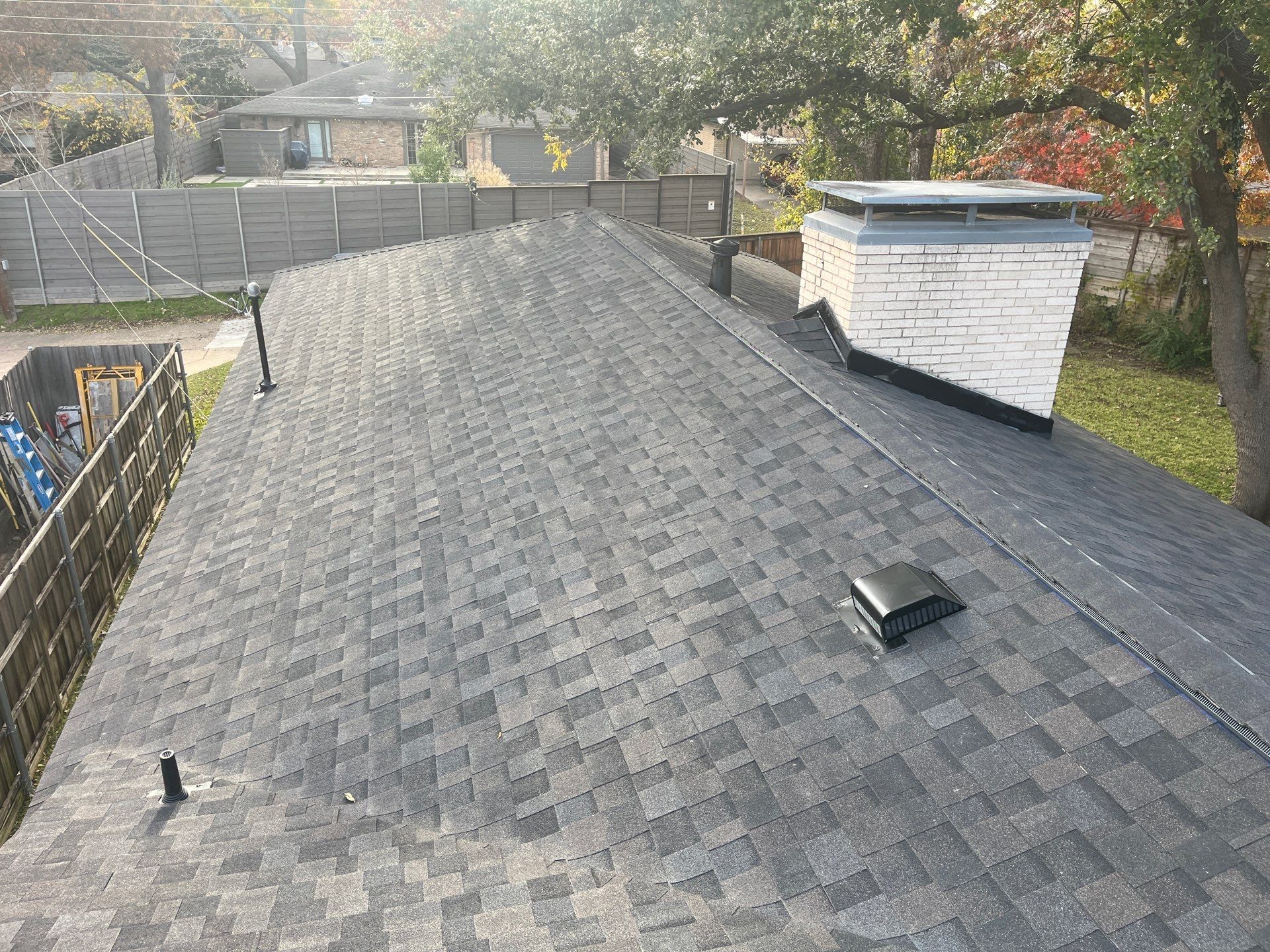 IKO Brownstone- White Brick  by Tejas Roofworks + Restoration