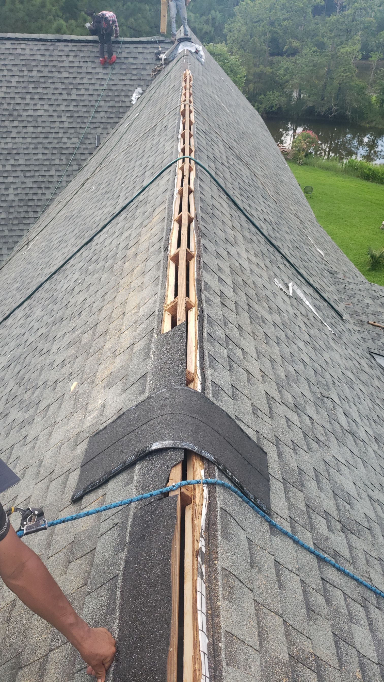 Residential Roofing Installation using Roof Replacement by American Roofing & Construction LLC