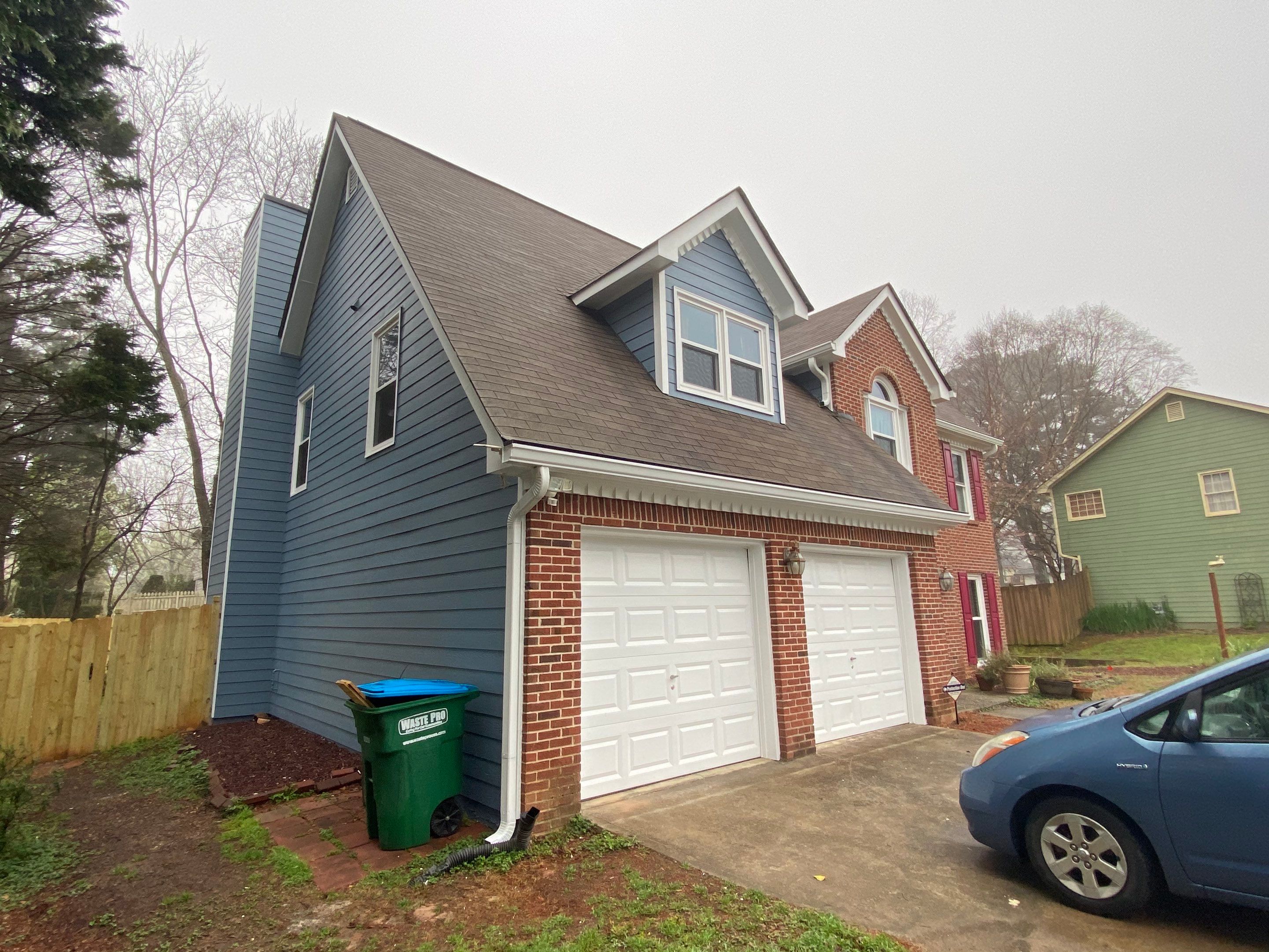 Full Exterior Siding Replacement and Trim Painting in Duluth by Swift Home Renovations
