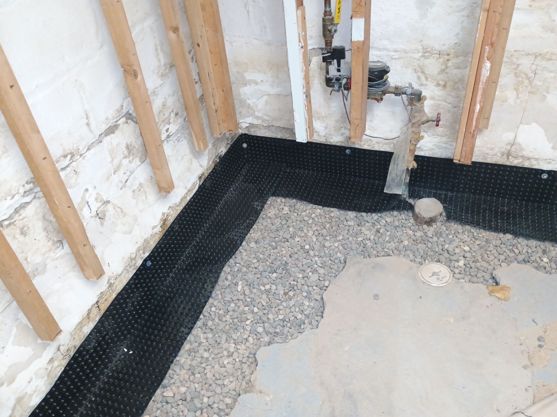 Interior Drain Tile Installation in South Minneapolis by Waterproofing Northeast