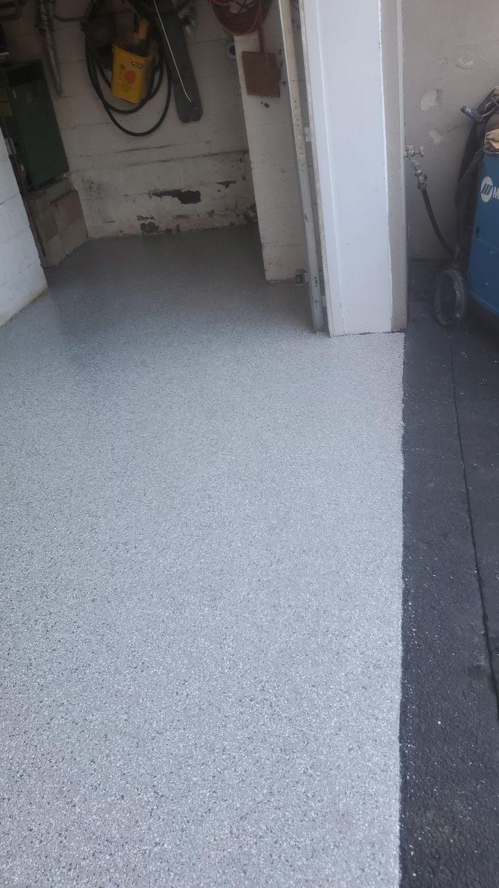 Garage Floor In Mt. Everest by Spectrum Painting, LLC