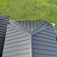 24ga 1.5" Mechanical Seam Dark Bronze by Total Roofing System The Metal Roof Experts