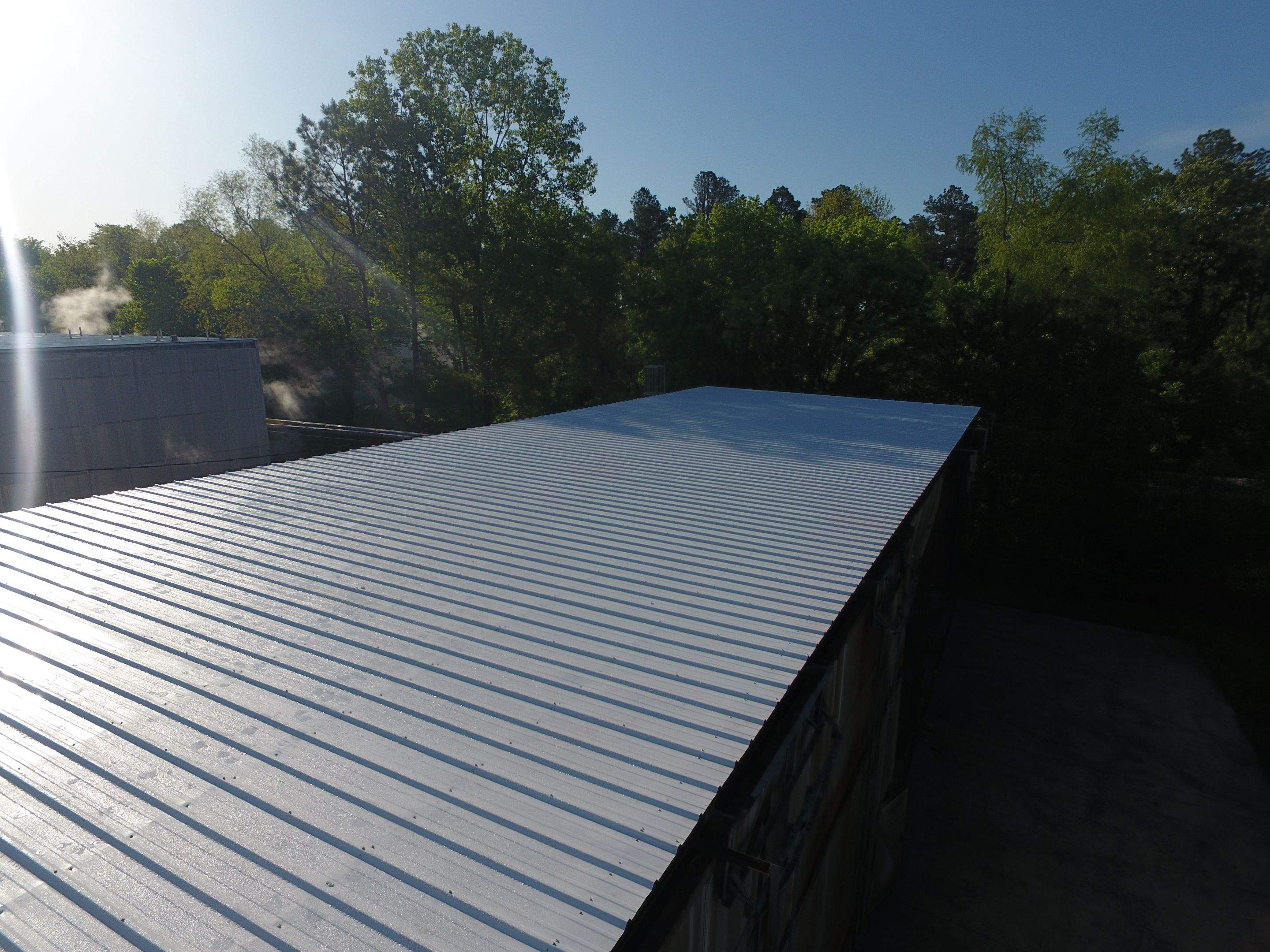 Commercial Roofing Installation using Aluminum Roofing panels by Hostetler Roofing