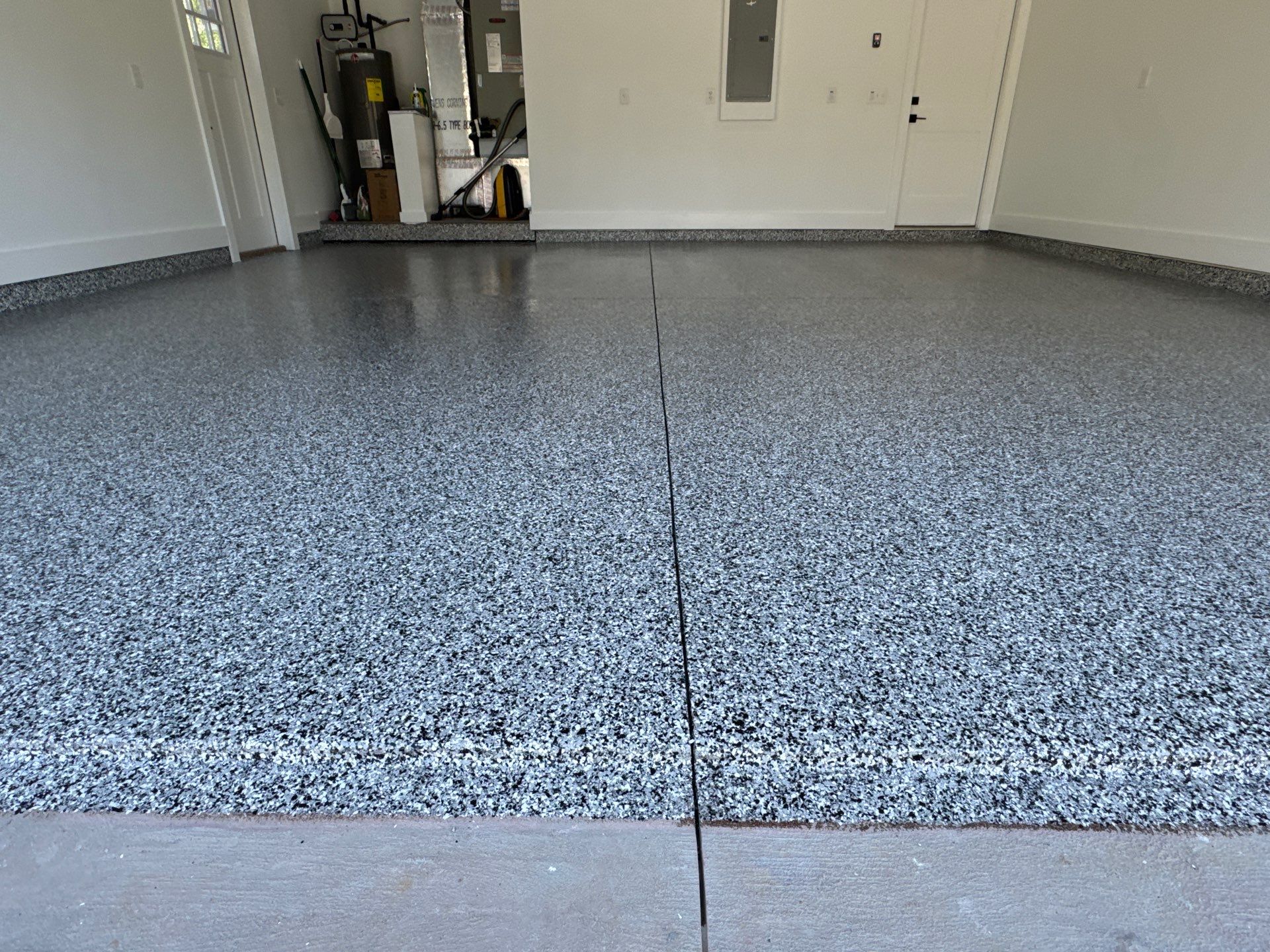 Garage in Domino by Cross Creek Concrete Coatings