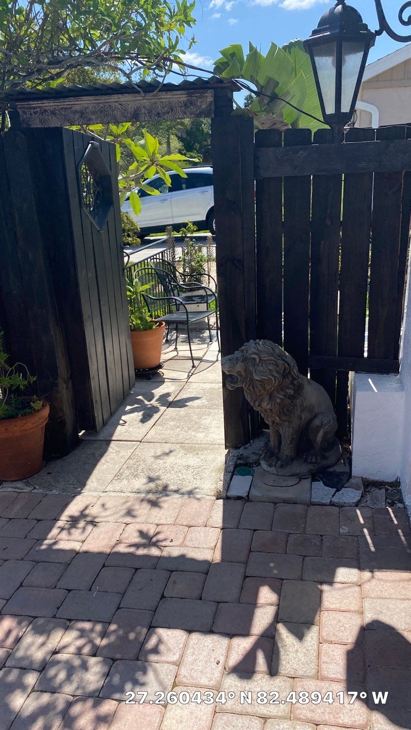 Sarasota, FL 6ft. Tall Horizontal Shadowbox Wood with 4ft. Tall 3-Rail Black Aluminum Fence by Asap fence and gates, LLC