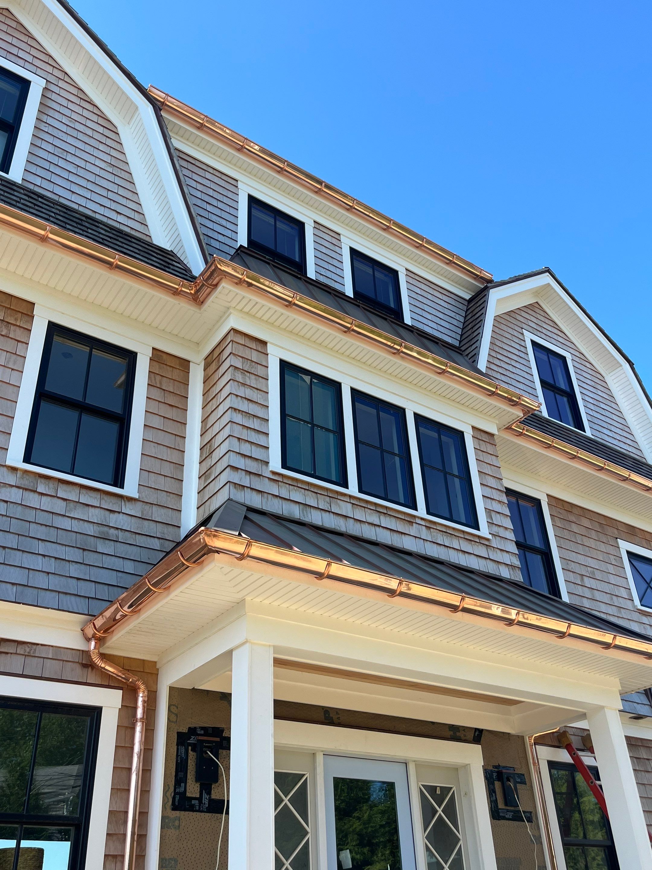 Great Island - Red Cedar Roofing, Yellow Cedar Siding, Standing Seam Copper, & Copper Gutters by Rinaldi Brothers