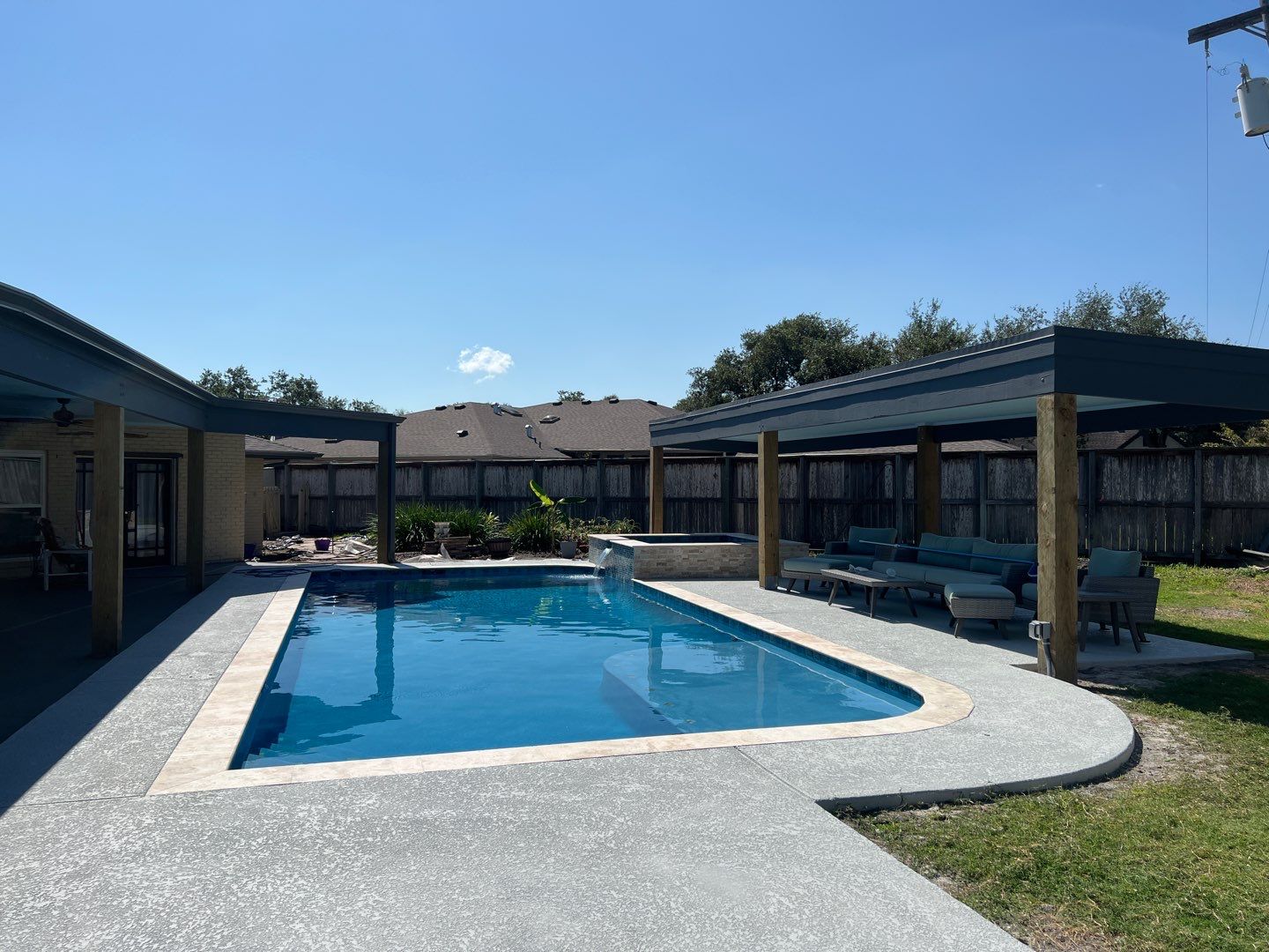 Beautiful pool side build by Bayfront Roofing and Construction