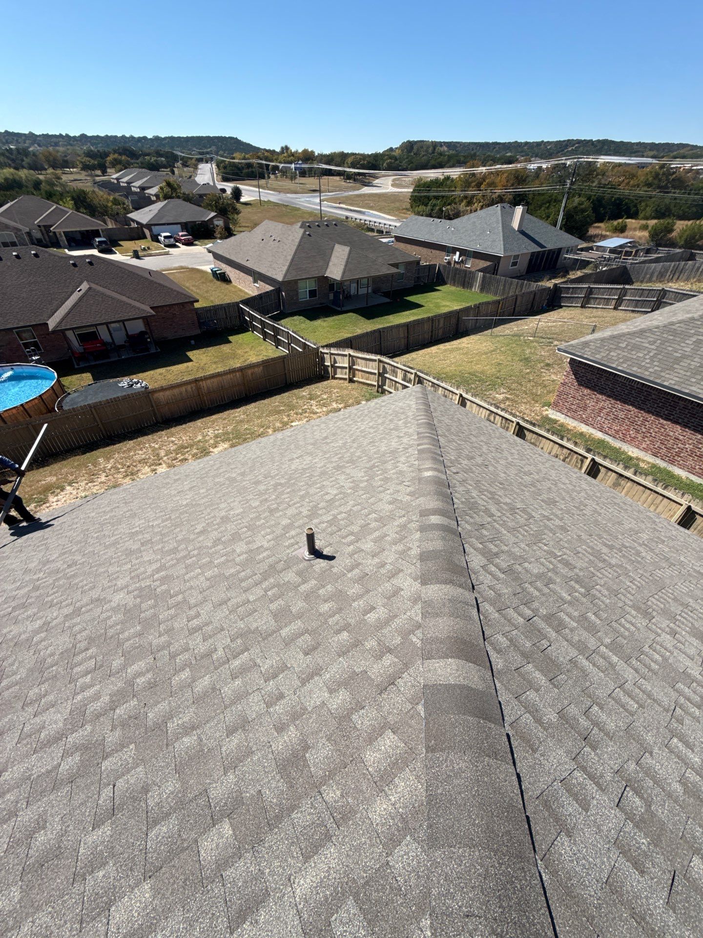 Residential Roof Replacement using GAF - Natural Shadow - Weathered Wood by Action Exteriors Austin
