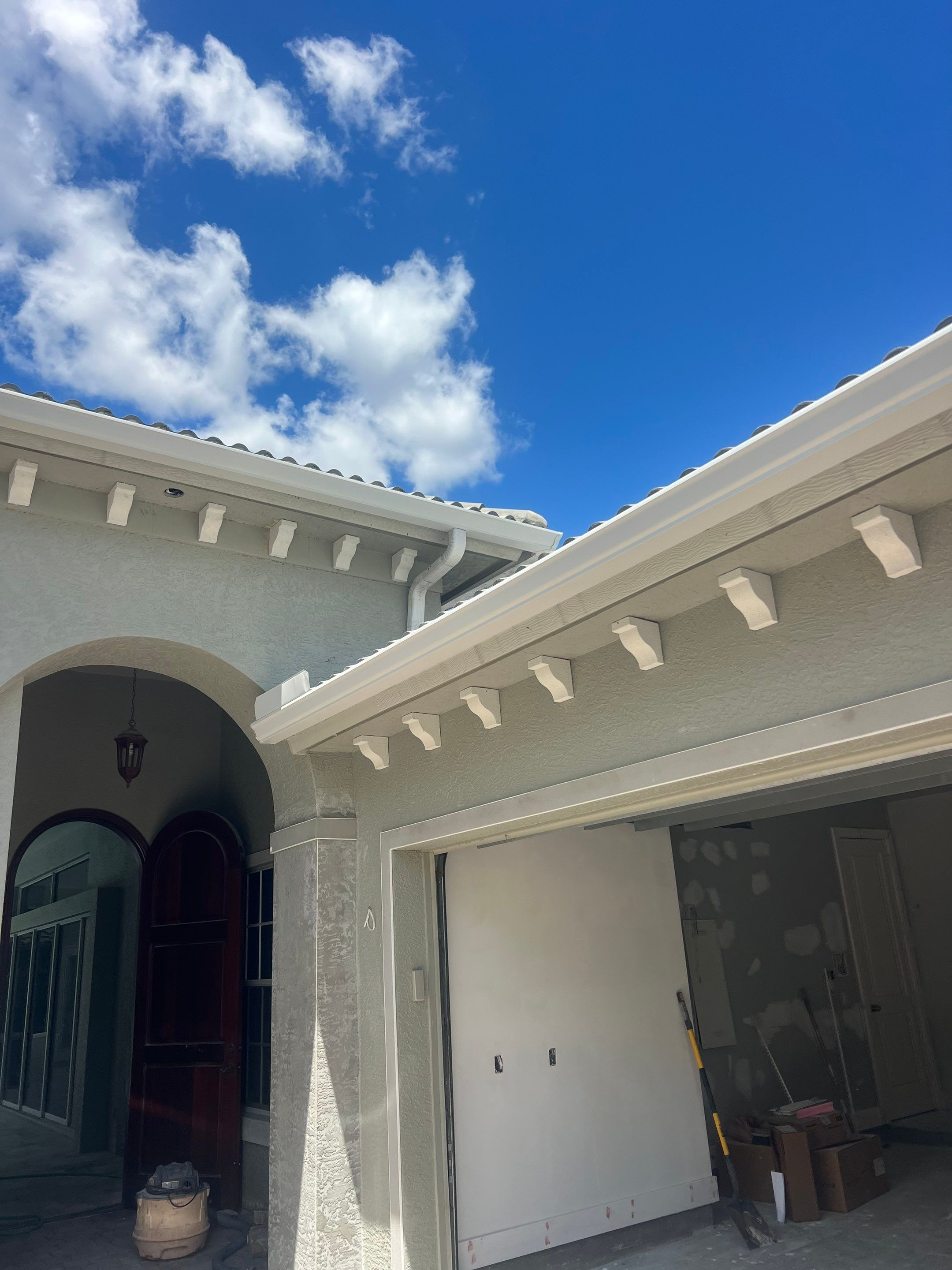6 Inch Seamless Gutters and Downspout Installation in Naples FL by Gutter Professors